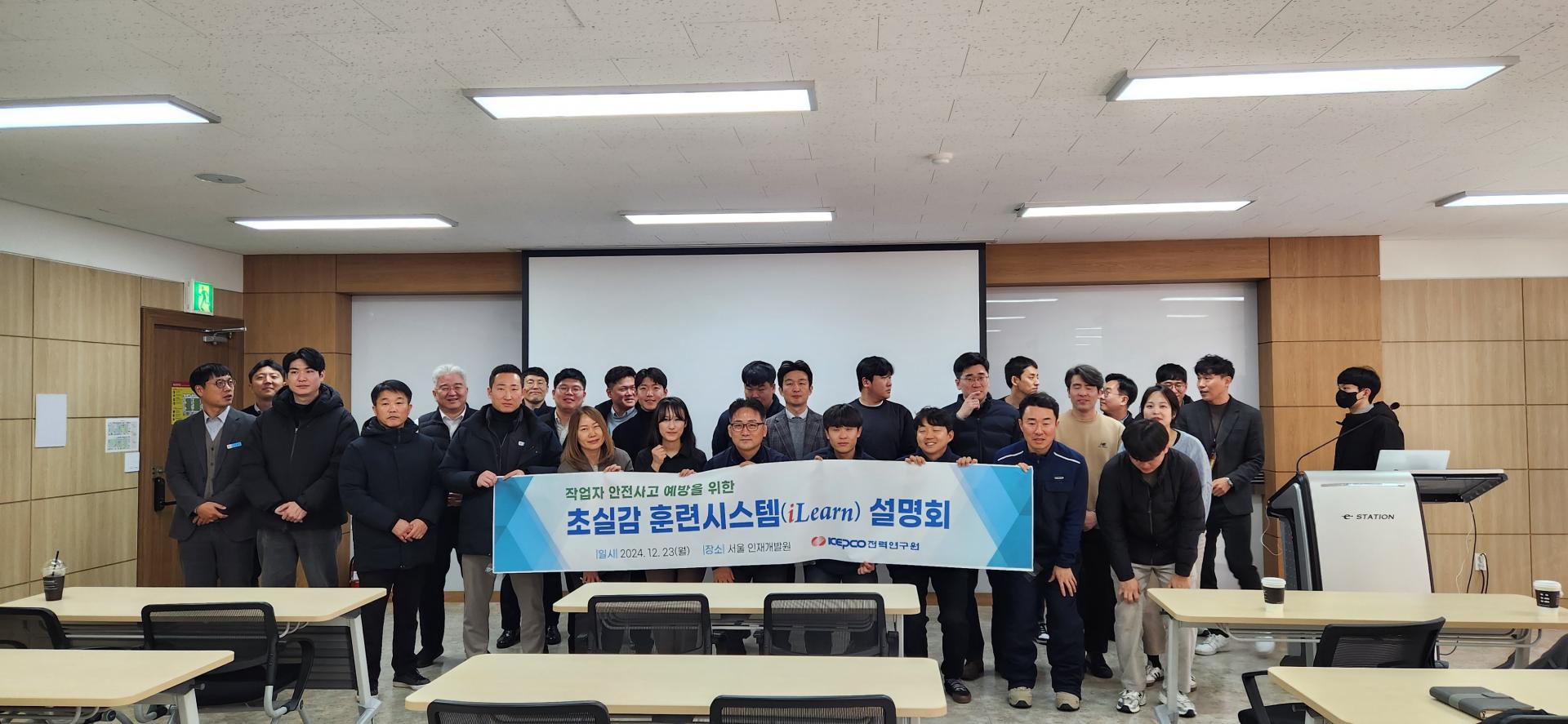 Participants at an information session on iPOP's immersive training system