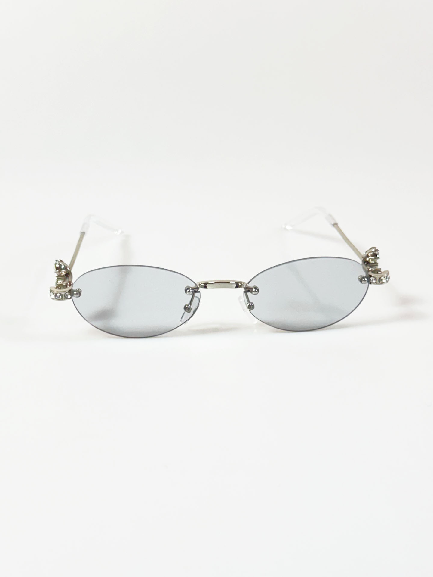 Crystal Detail Rimless Oval Silver Metal Frame Sunglasses