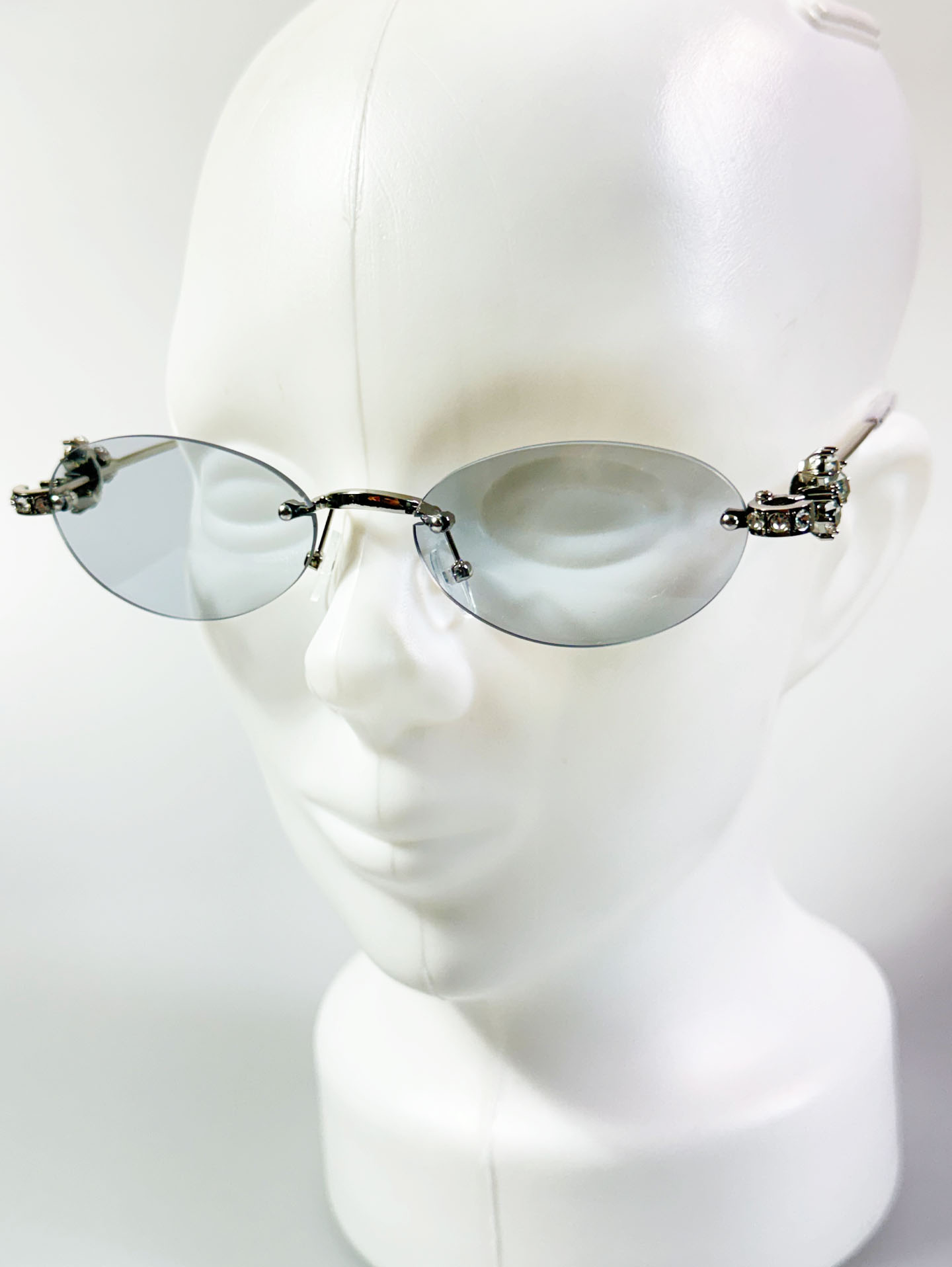 Crystal Detail Rimless Oval Silver Metal Frame Sunglasses