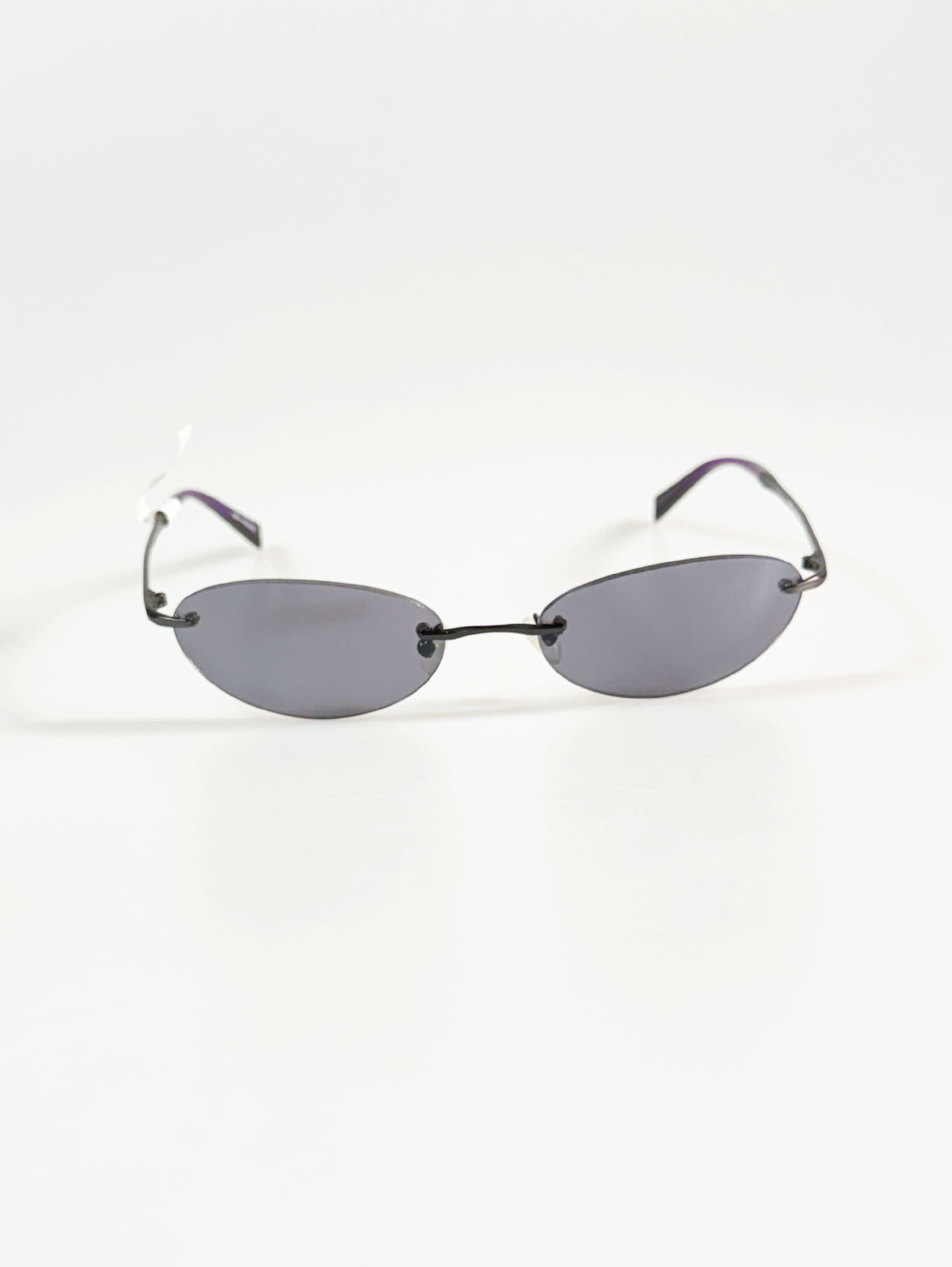 SILVIO VALENCIA Smoke Oval Rimless Metal Sunglasses