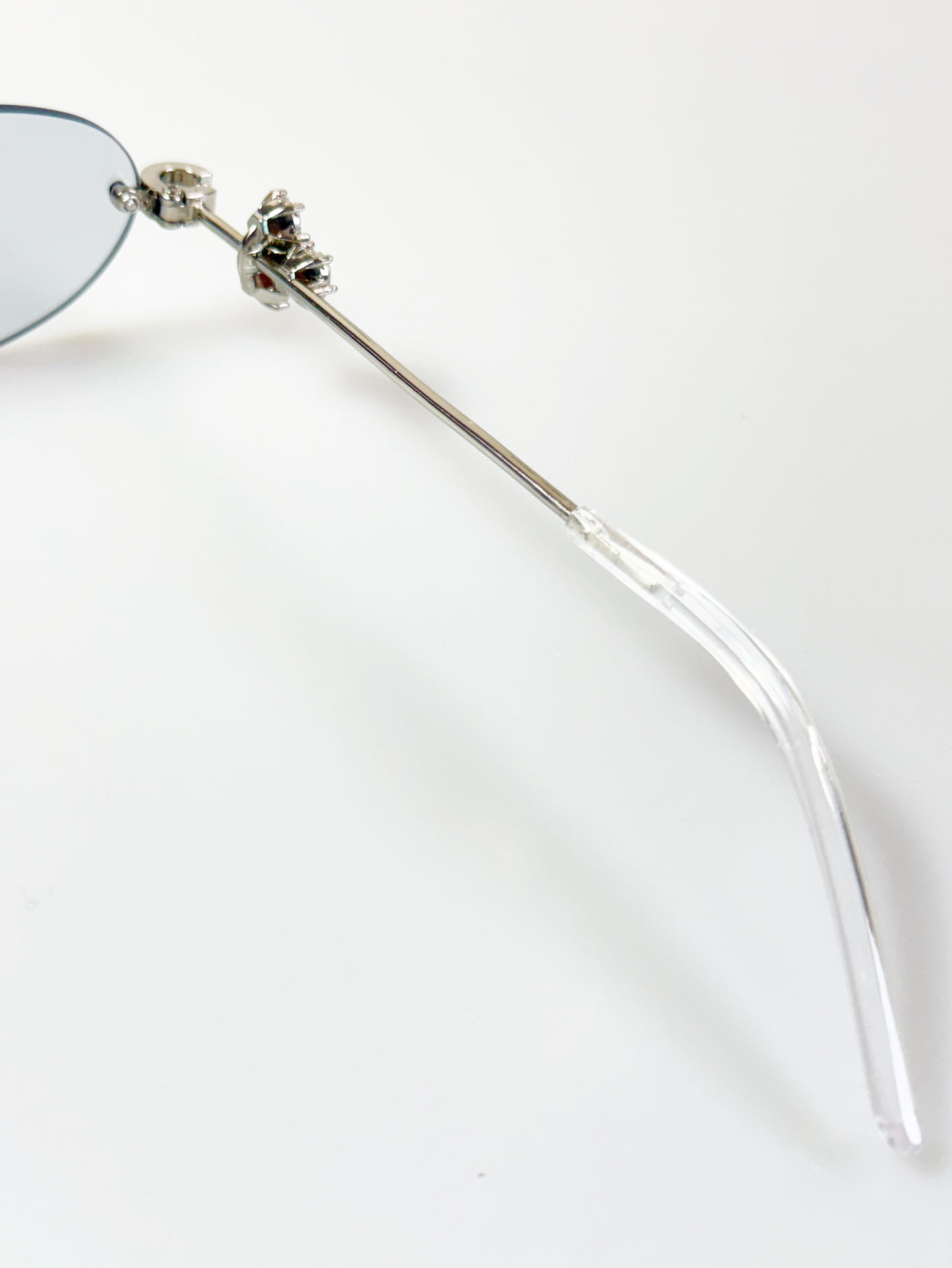 Crystal Detail Rimless Oval Silver Metal Frame Sunglasses