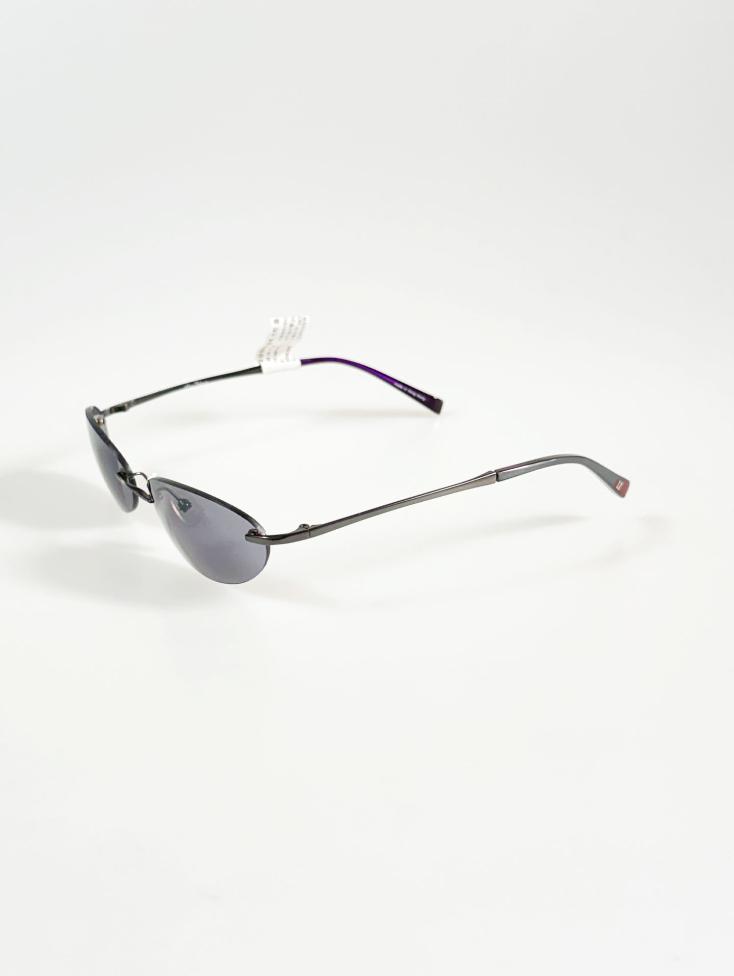 SILVIO VALENCIA Smoke Oval Rimless Metal Sunglasses