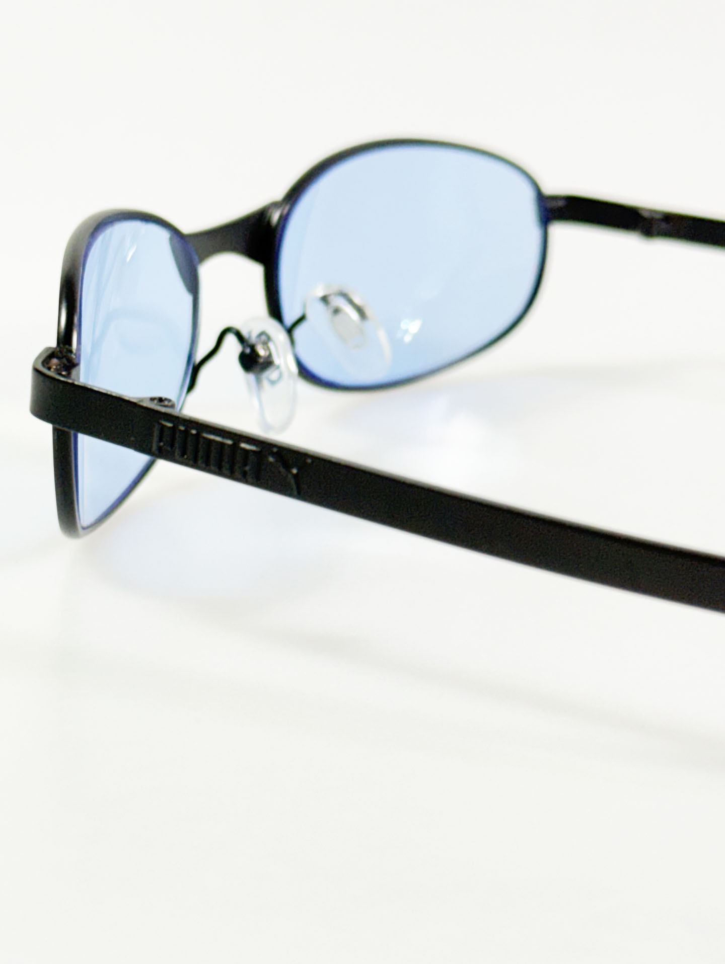 90's PUMA Matte Black Slim Oval Metal Tint Sunglasses