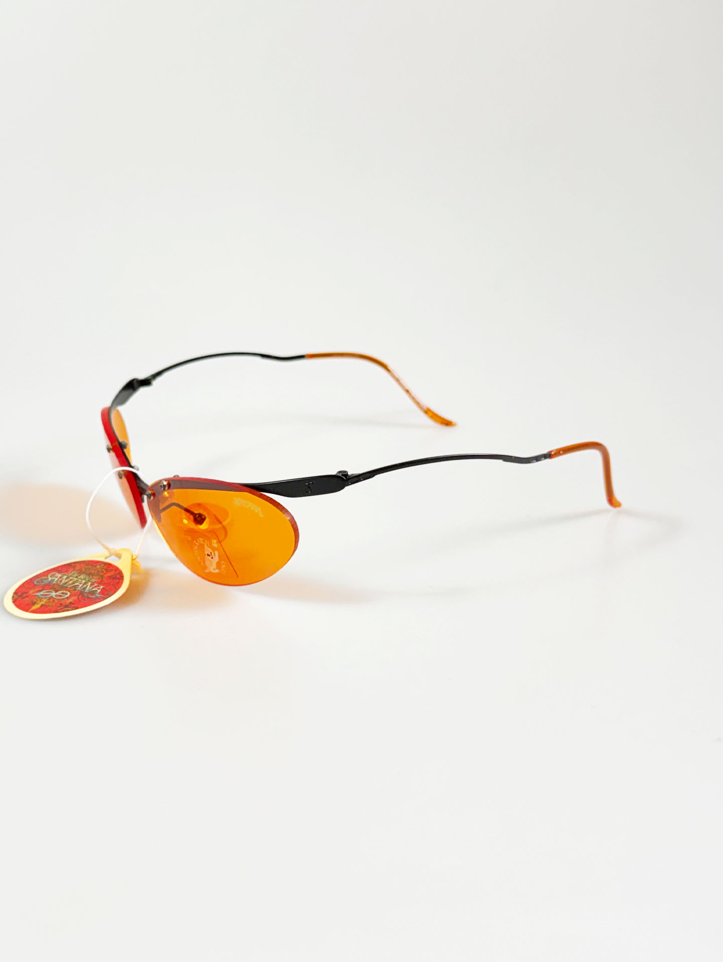 90's SANTANA Gunmetal Rimless Oval Orange Tint Sunglasses
