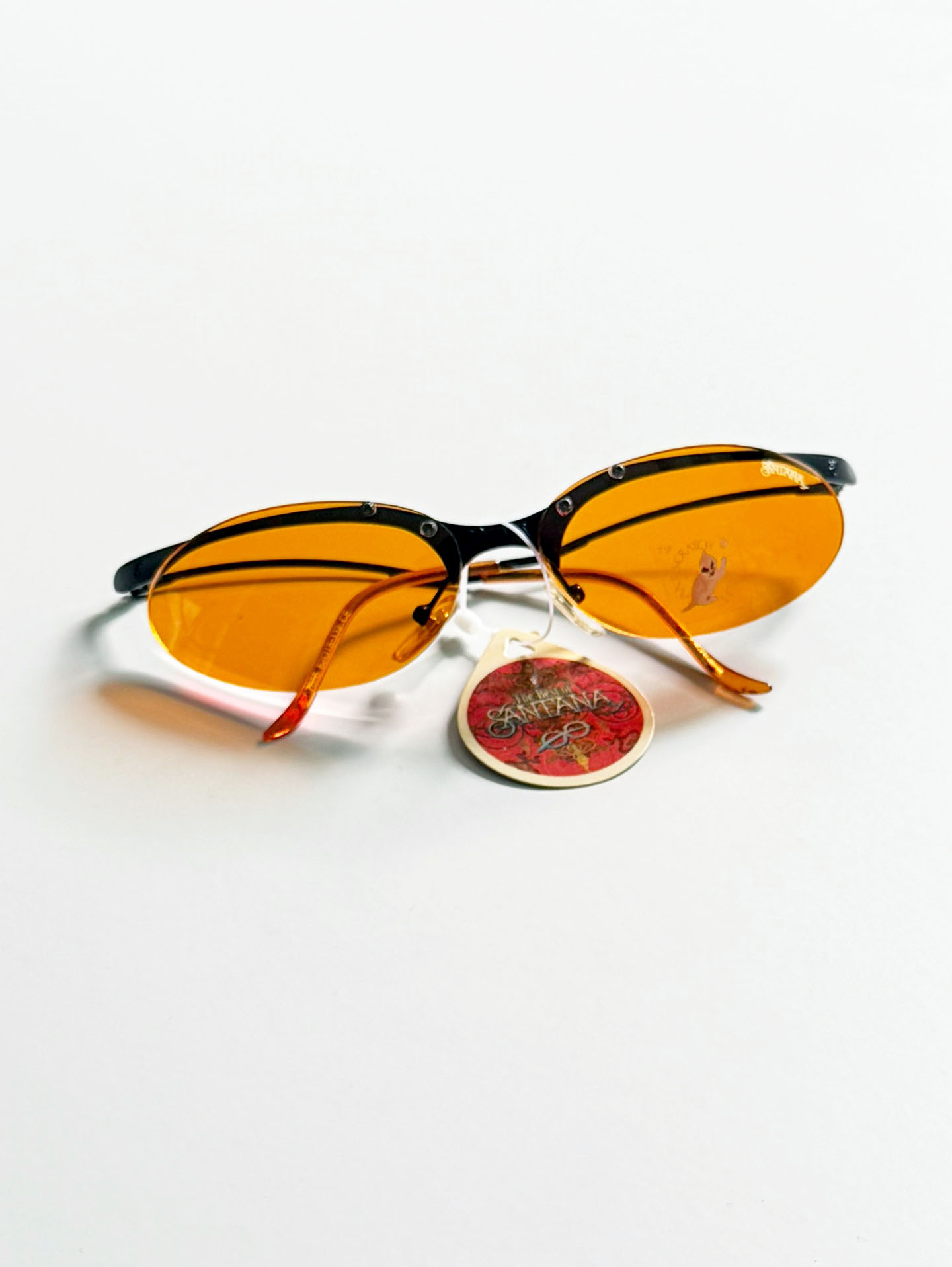 90's SANTANA Gunmetal Rimless Oval Orange Tint Sunglasses