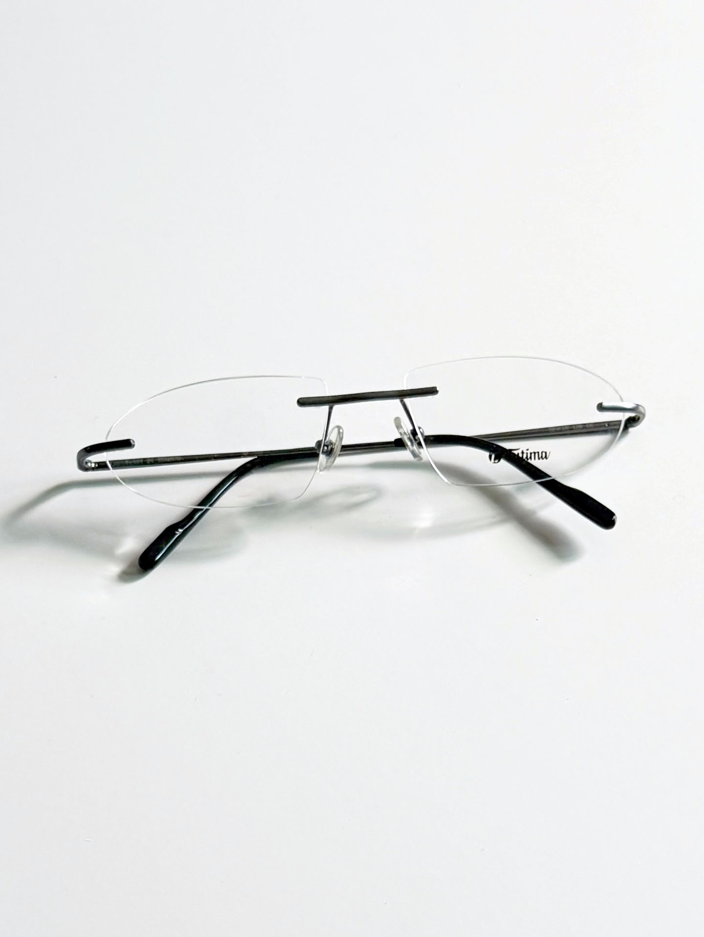 TUTIMA Dark Silver Titanium Rimless Square Frame Glasses