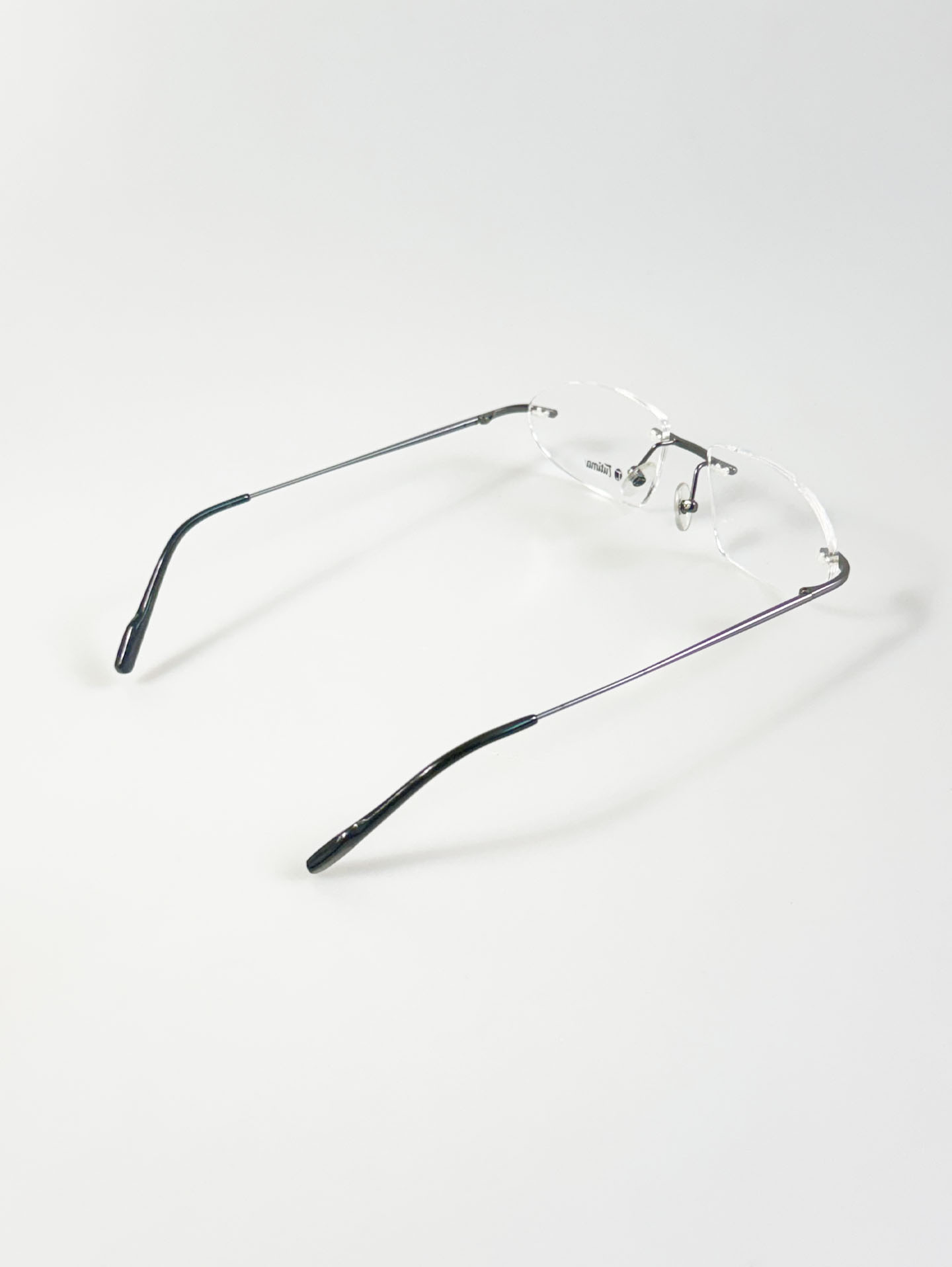 TUTIMA Dark Silver Titanium Rimless Square Frame Glasses