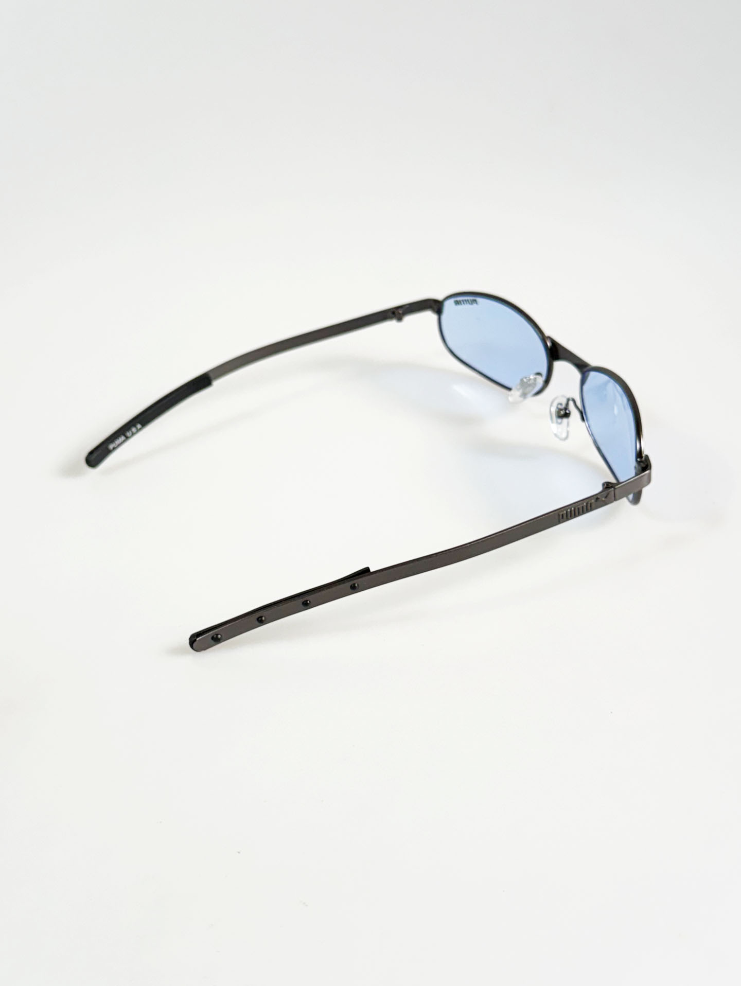 90's PUMA Dark Gunmetal Slim Oval Tint Sunglasses