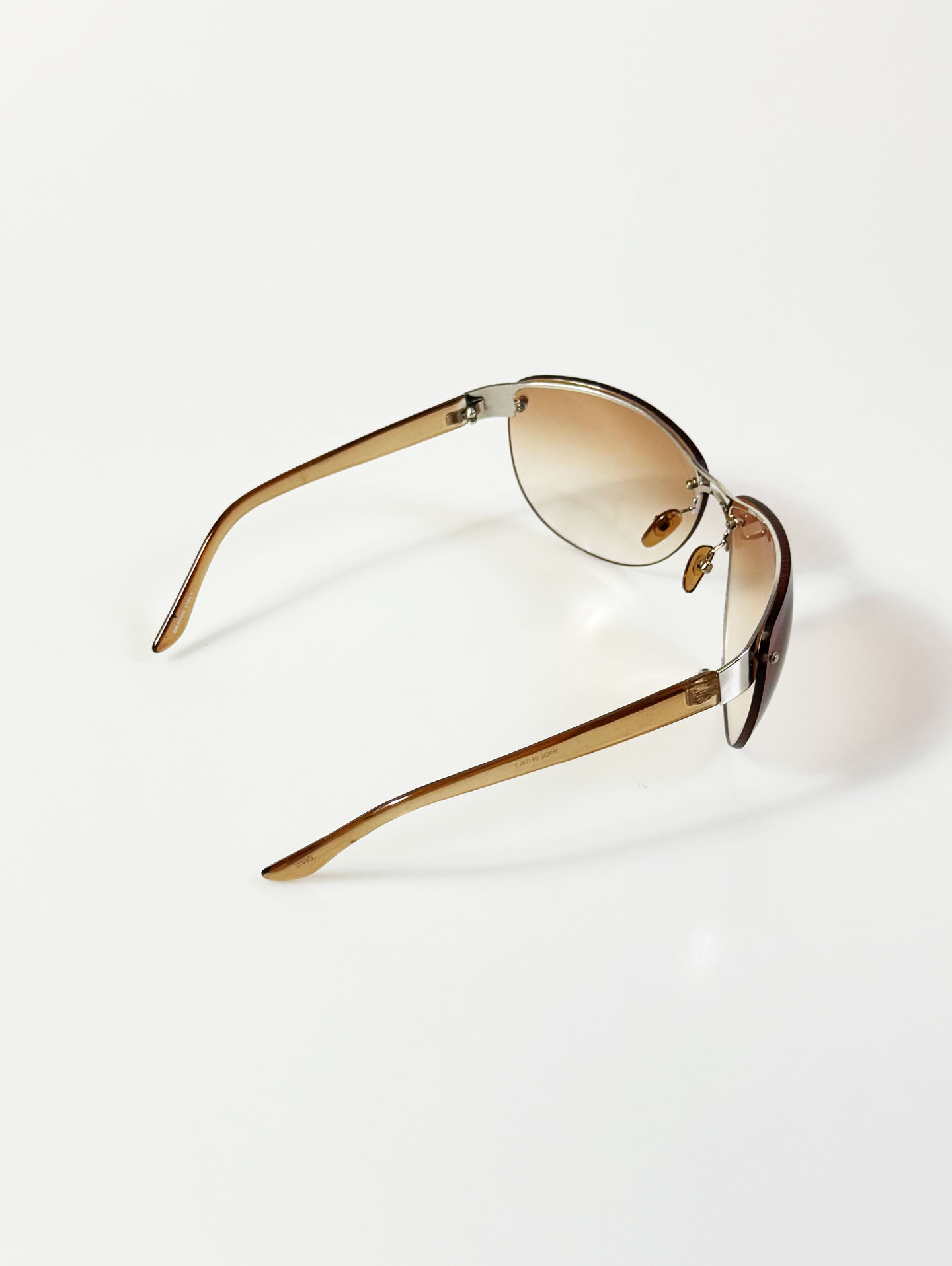 Wraparound Shield Rimless Metal Frame Tinted Sunglasses