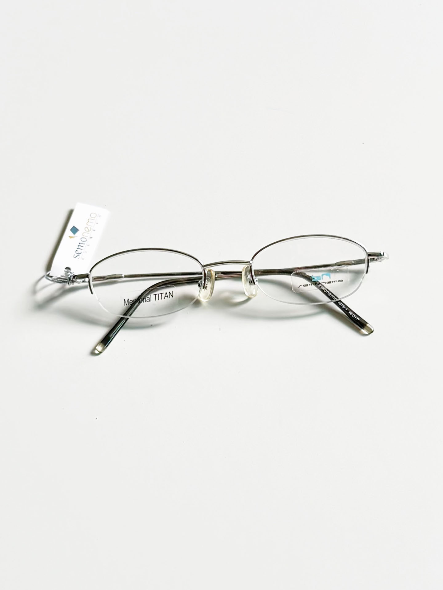 SEMONEMO Silver Titanium Half-Rim Oval Glasses