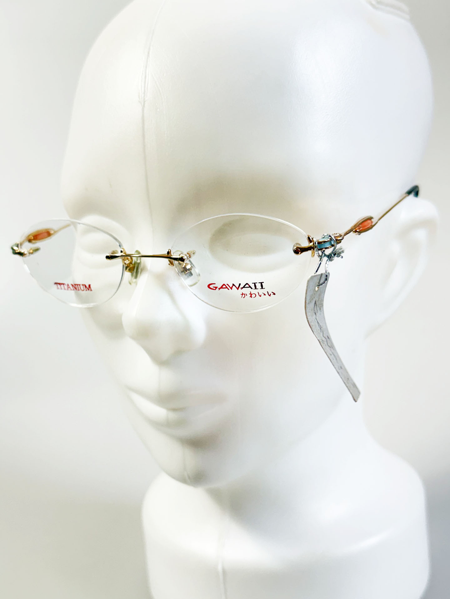 GAWAII Gold Rimless Oval Titanium Frame Glasses