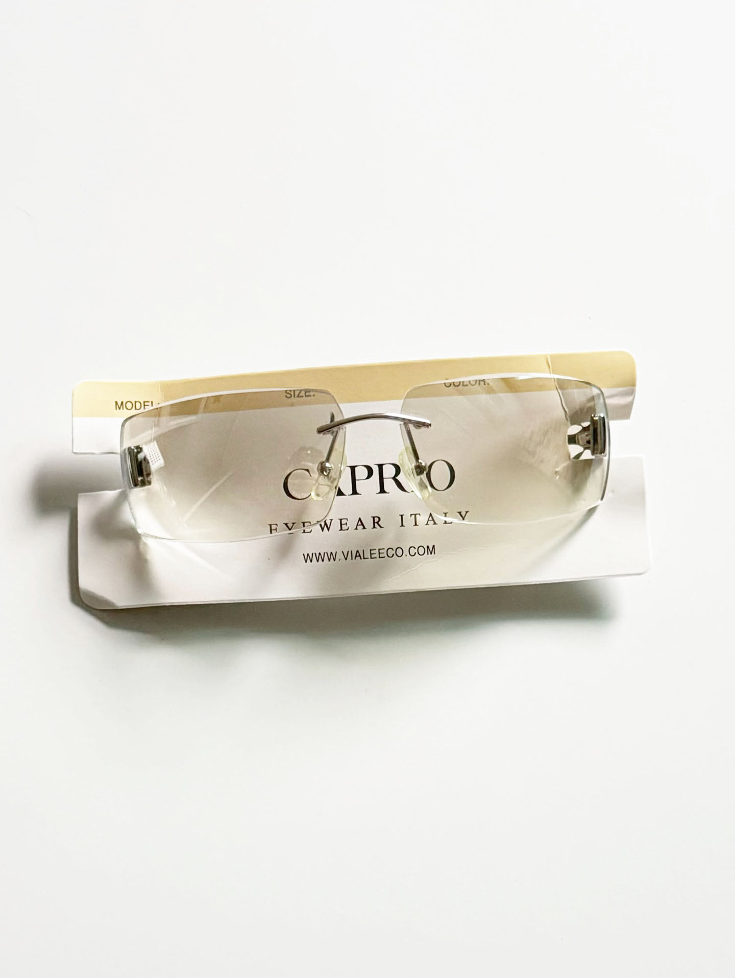CAPRIO Rimless Square Metal Tinted Sunglasses
