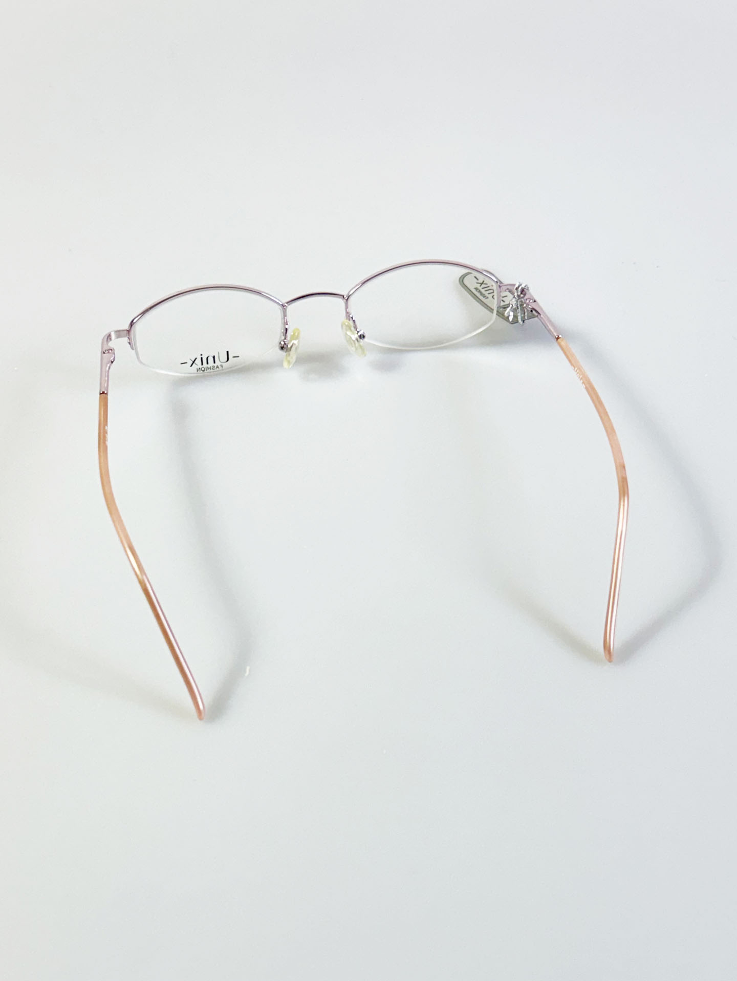 UNIX Light Pink Half-Rim Oval Metal Glasses