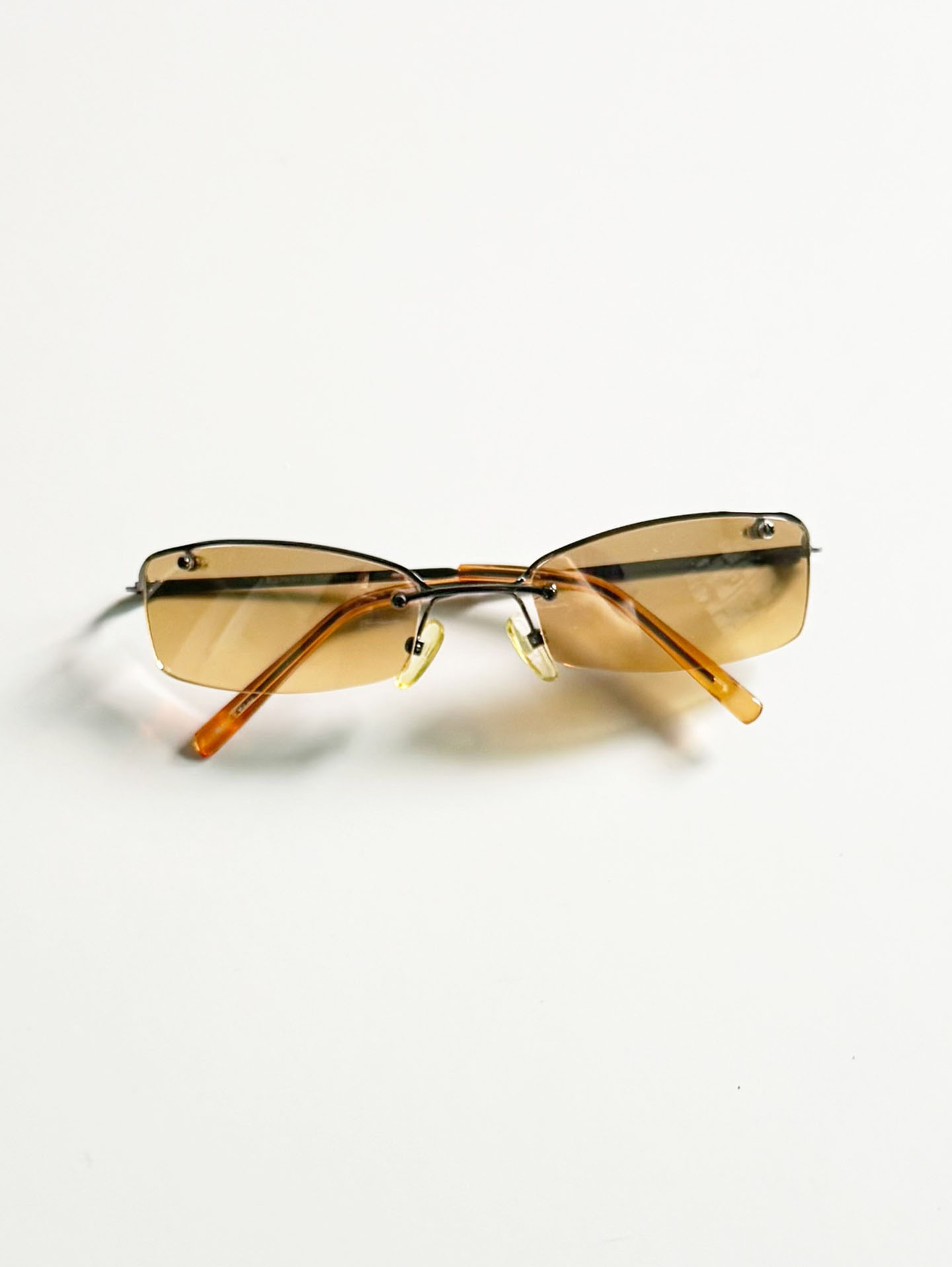 CAPRIO Gunmetal Rimless Square Tint Sunglasses
