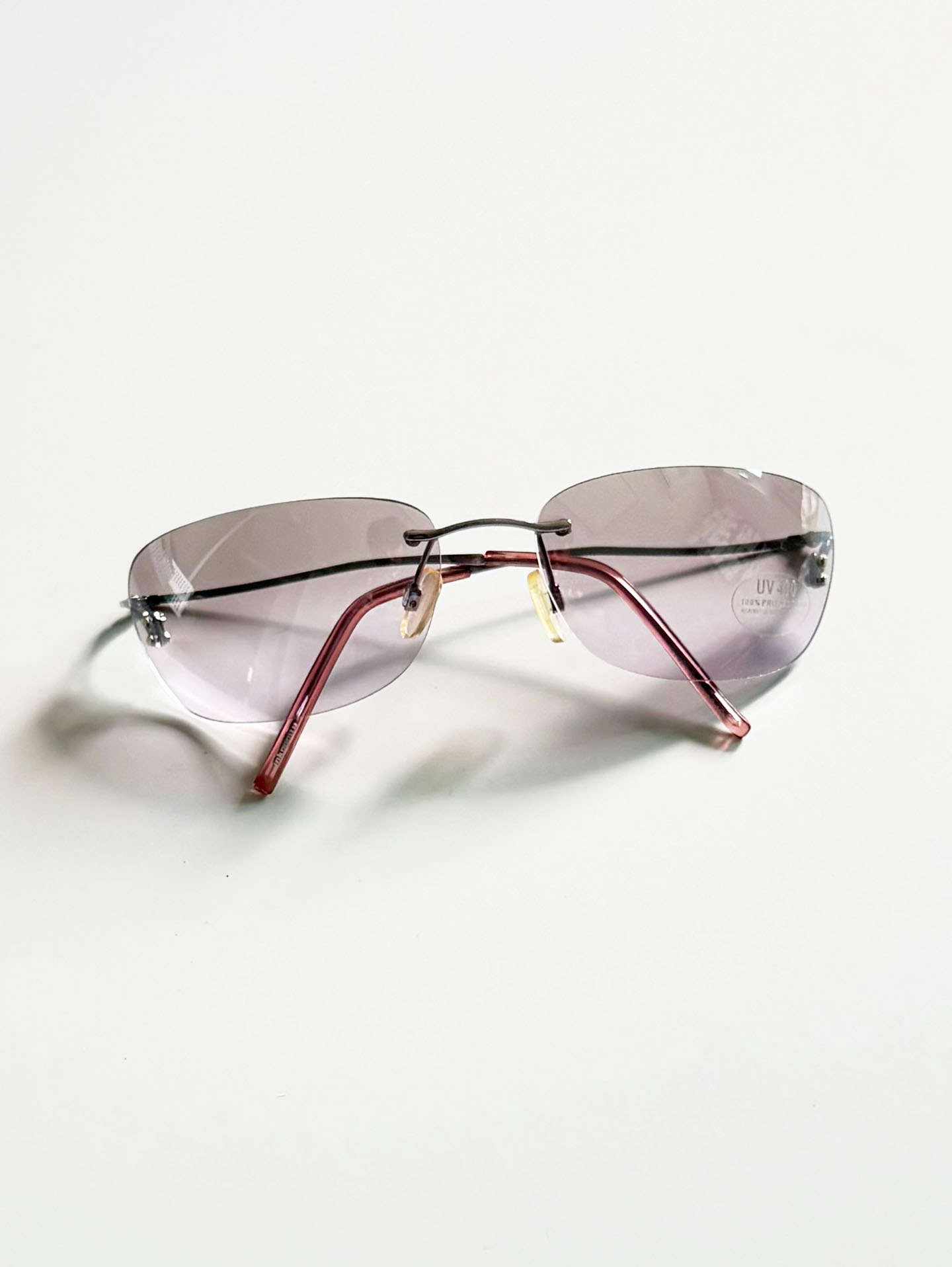 INKOGNITO Silver Rimless Square Tint Sunglasses