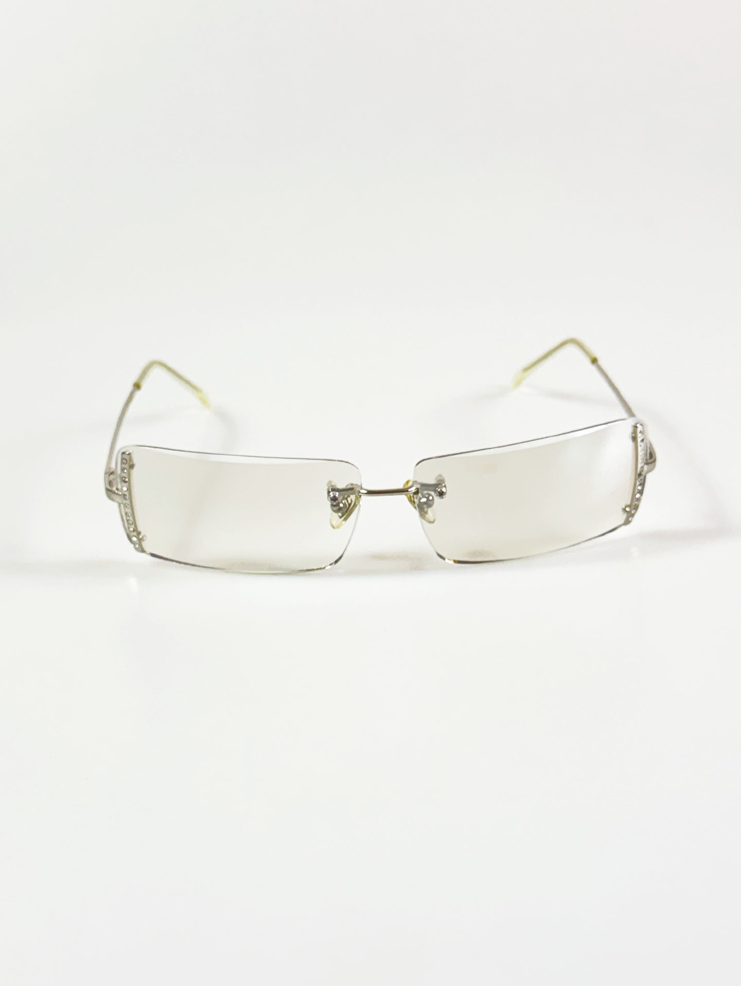 CAPRIO Silver Rimless Square Metal Clear Tinted Sunglasses
