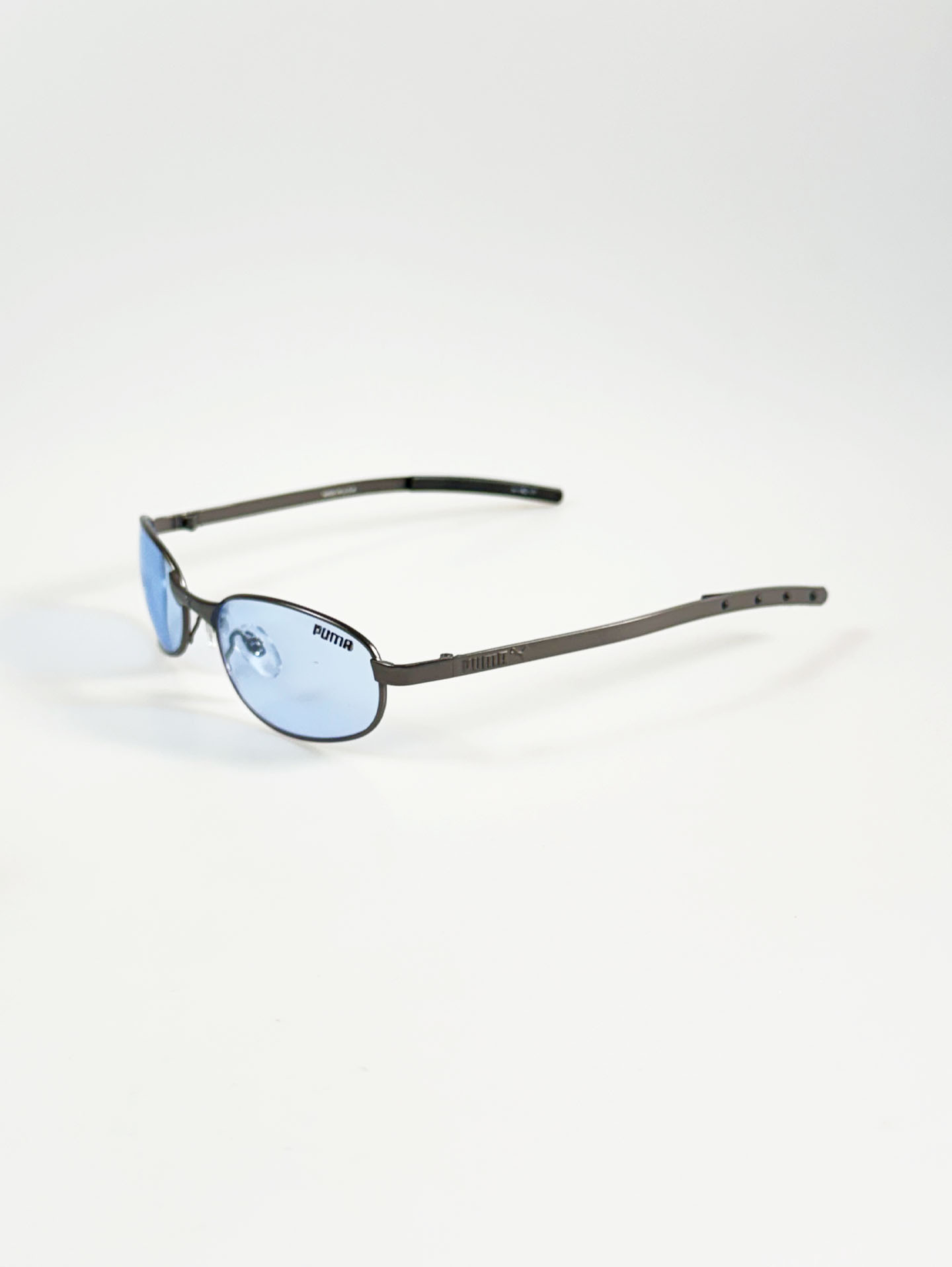 90's PUMA Dark Gunmetal Slim Oval Tint Sunglasses