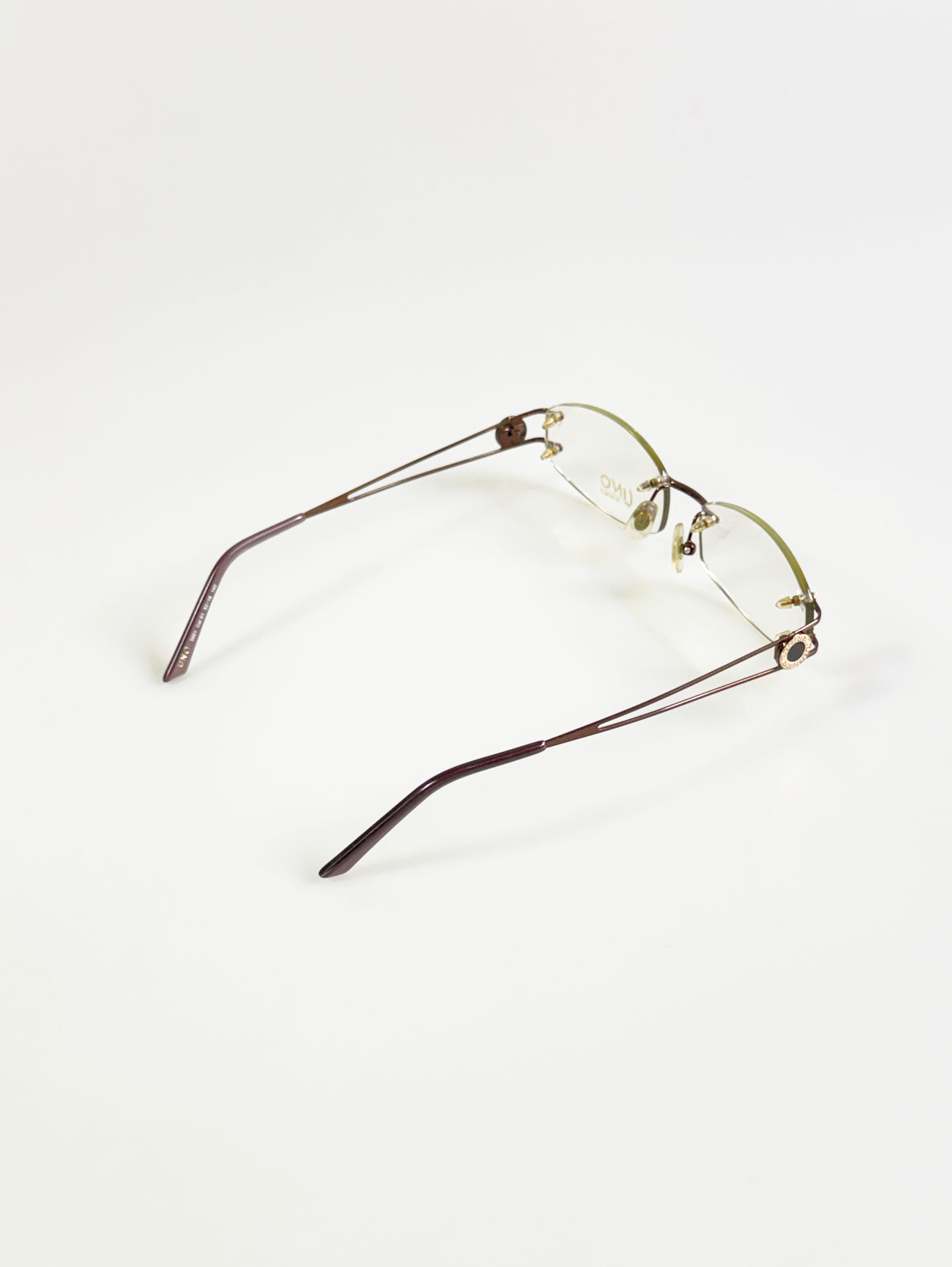 UNO Brown Rimless Oval Metal Glasses