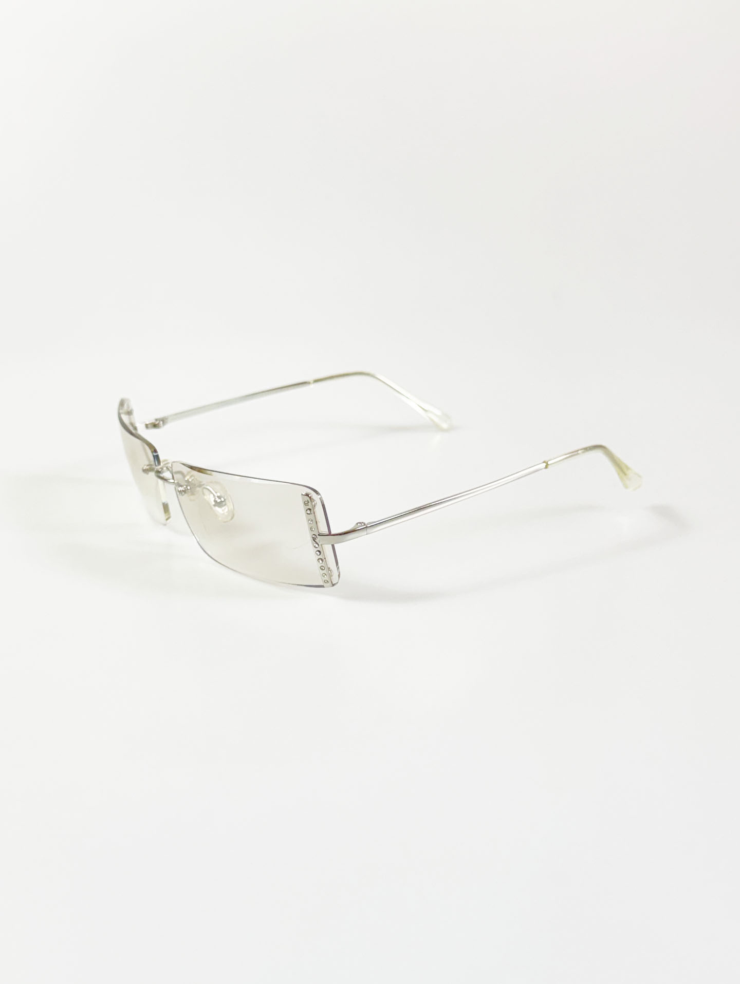 CAPRIO Silver Rimless Square Metal Clear Tinted Sunglasses