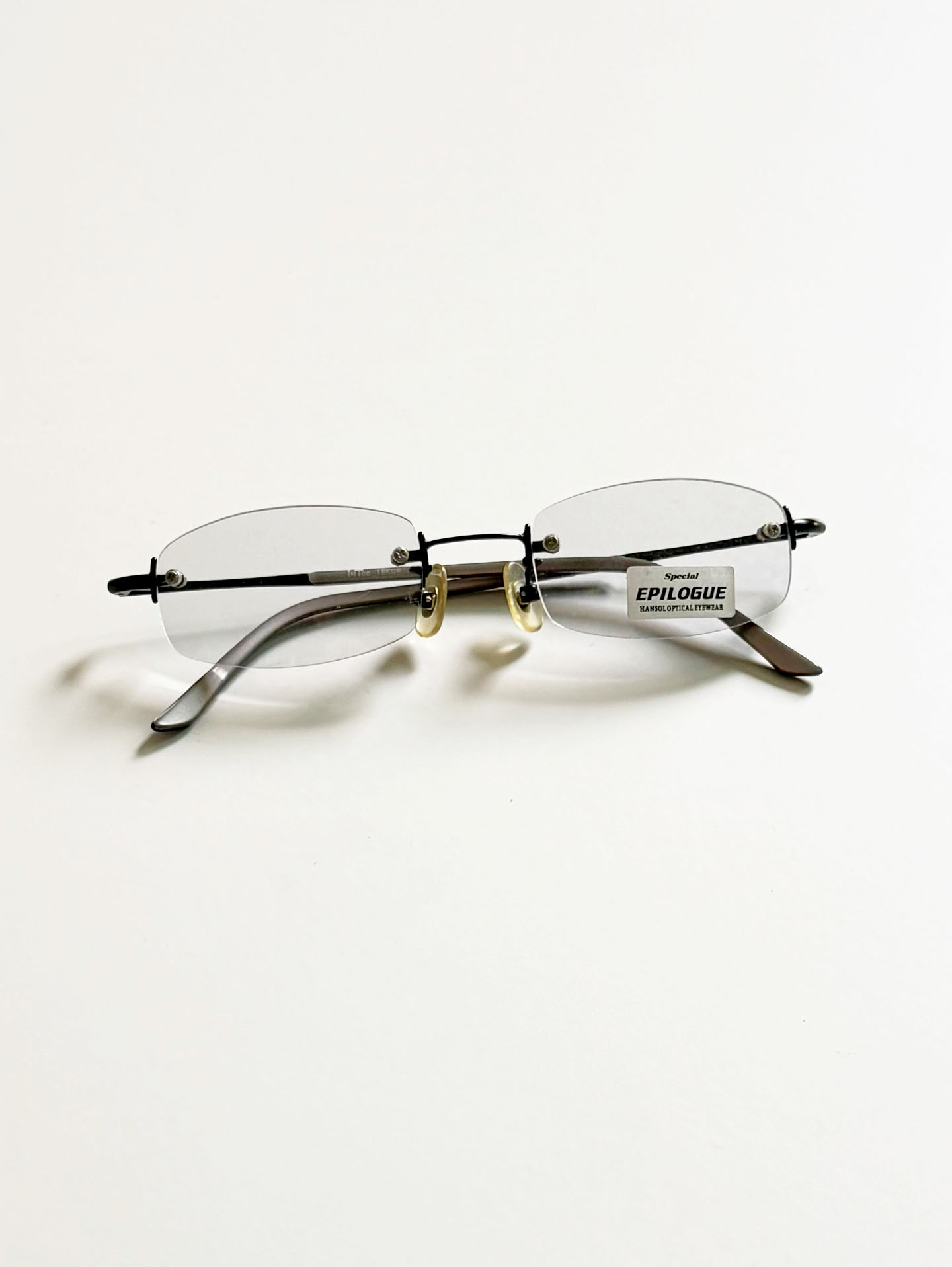 EPILOGUE Black Rimless Square Metal Frame Glasses