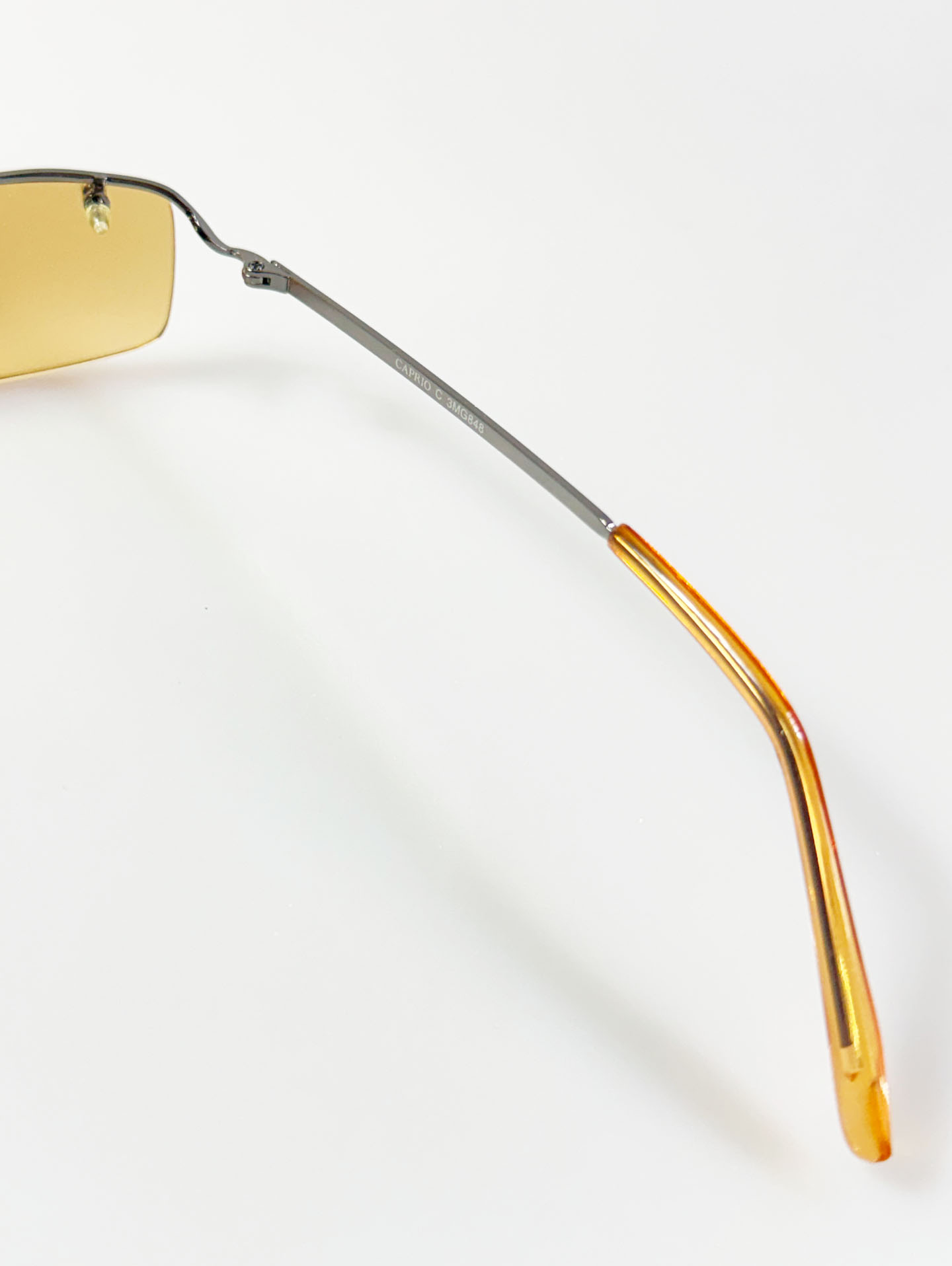 CAPRIO Gunmetal Rimless Square Tint Sunglasses