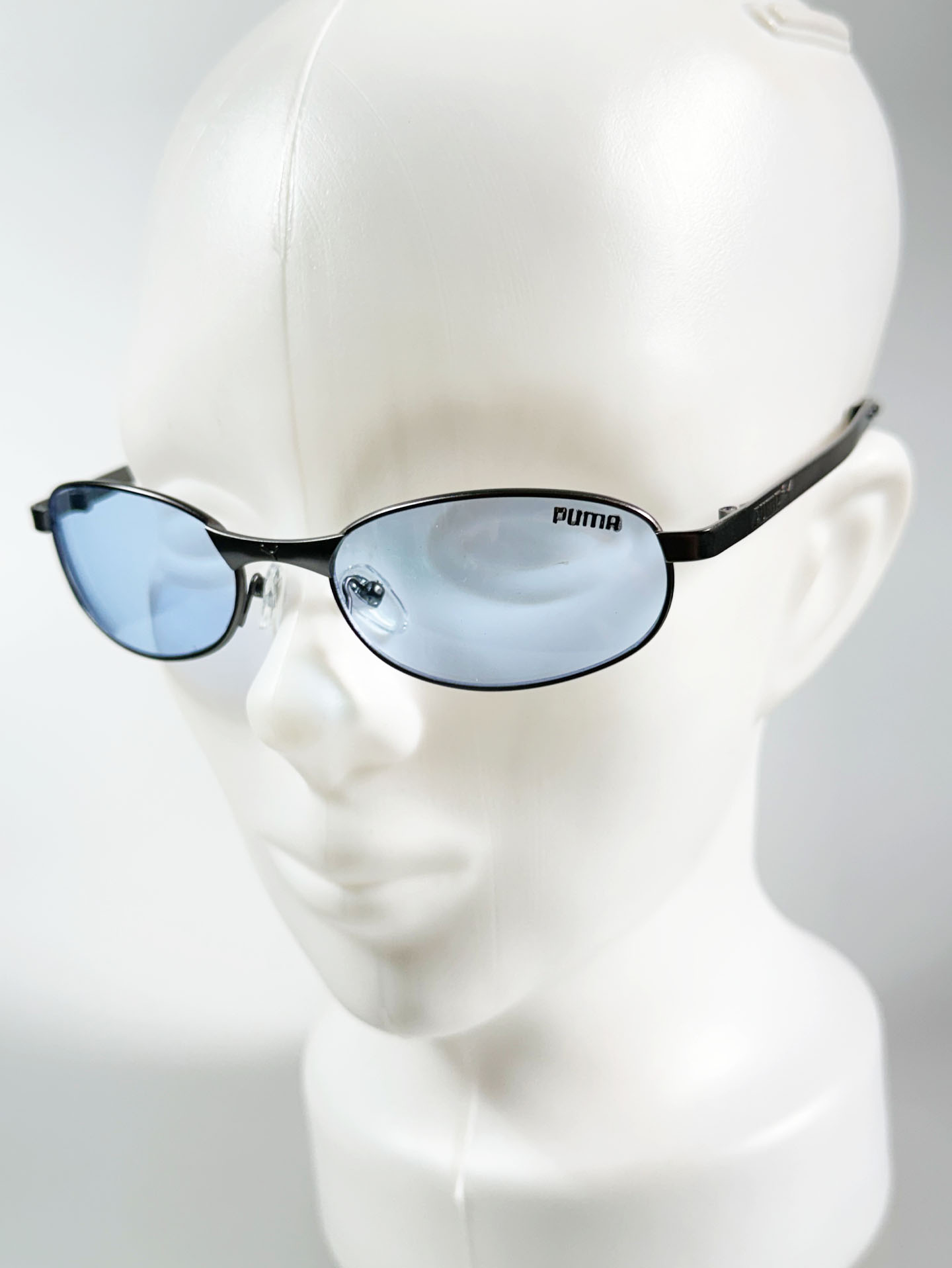 90's PUMA Dark Gunmetal Slim Oval Tint Sunglasses