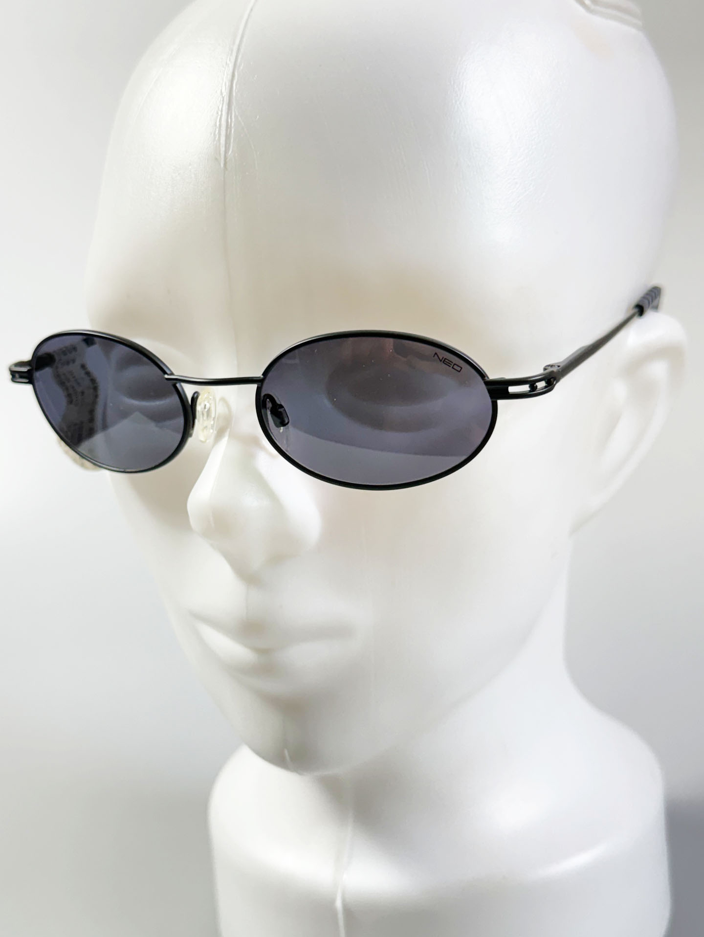 HOLIDAY by NEOSTYLE Black Slim Oval Metal Frame Sunglasses