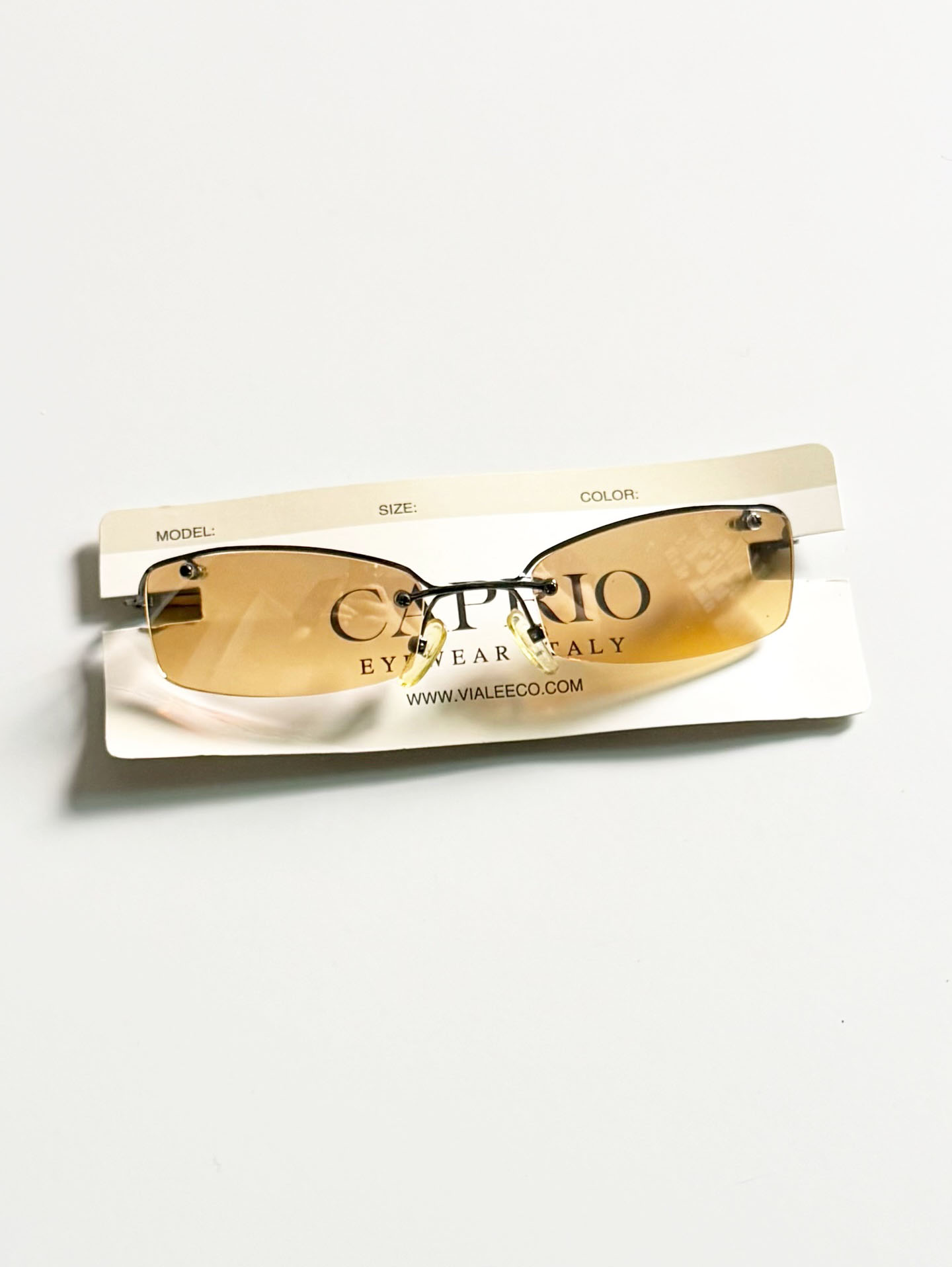 CAPRIO Gunmetal Rimless Square Tint Sunglasses
