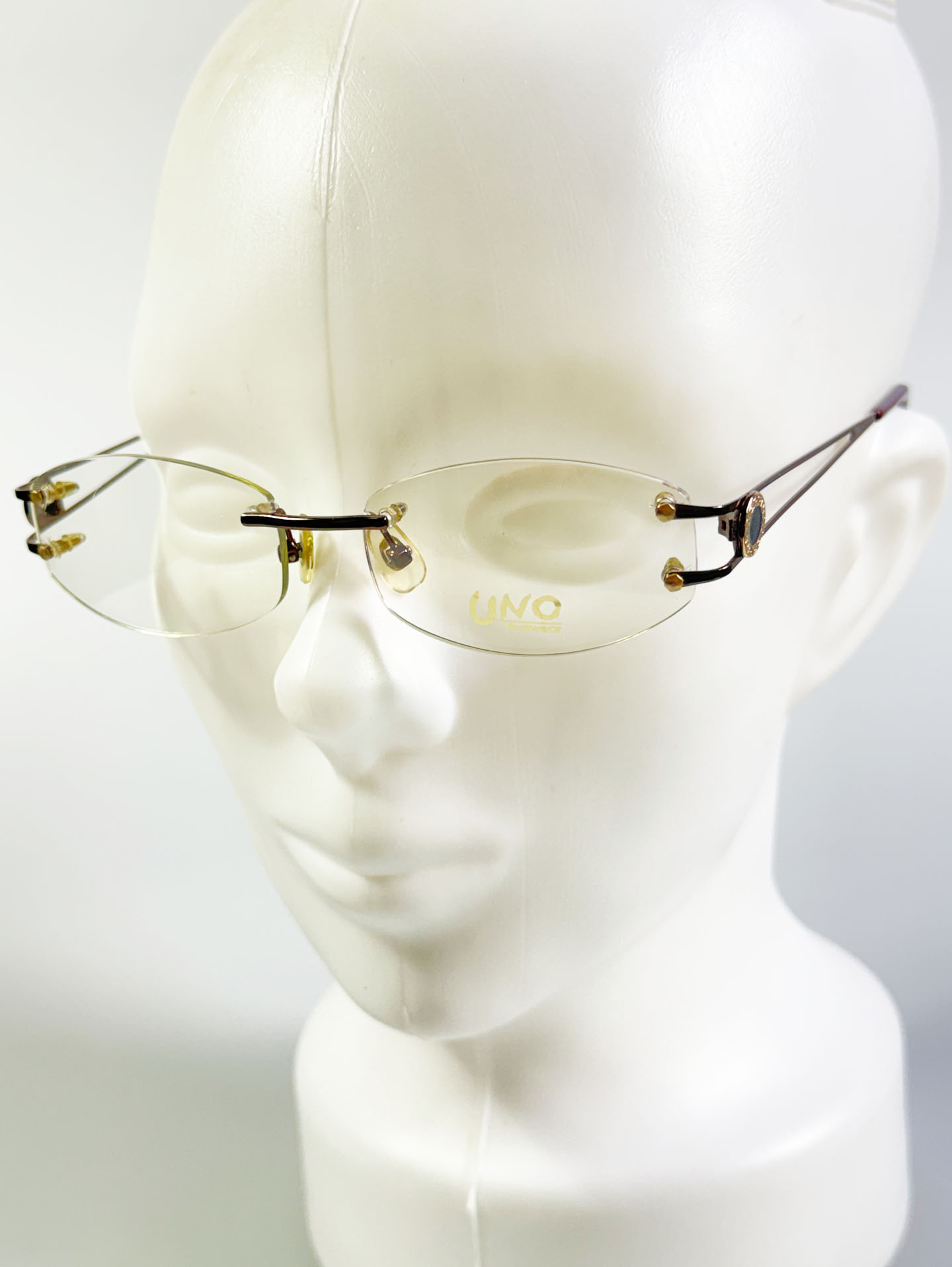 UNO Brown Rimless Oval Metal Glasses