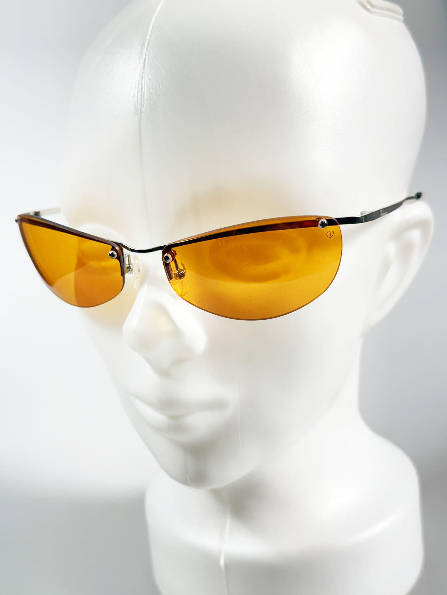 SILVIO VALENCIA Silver Rimless Oval Metal Orange Tint Sunglasses