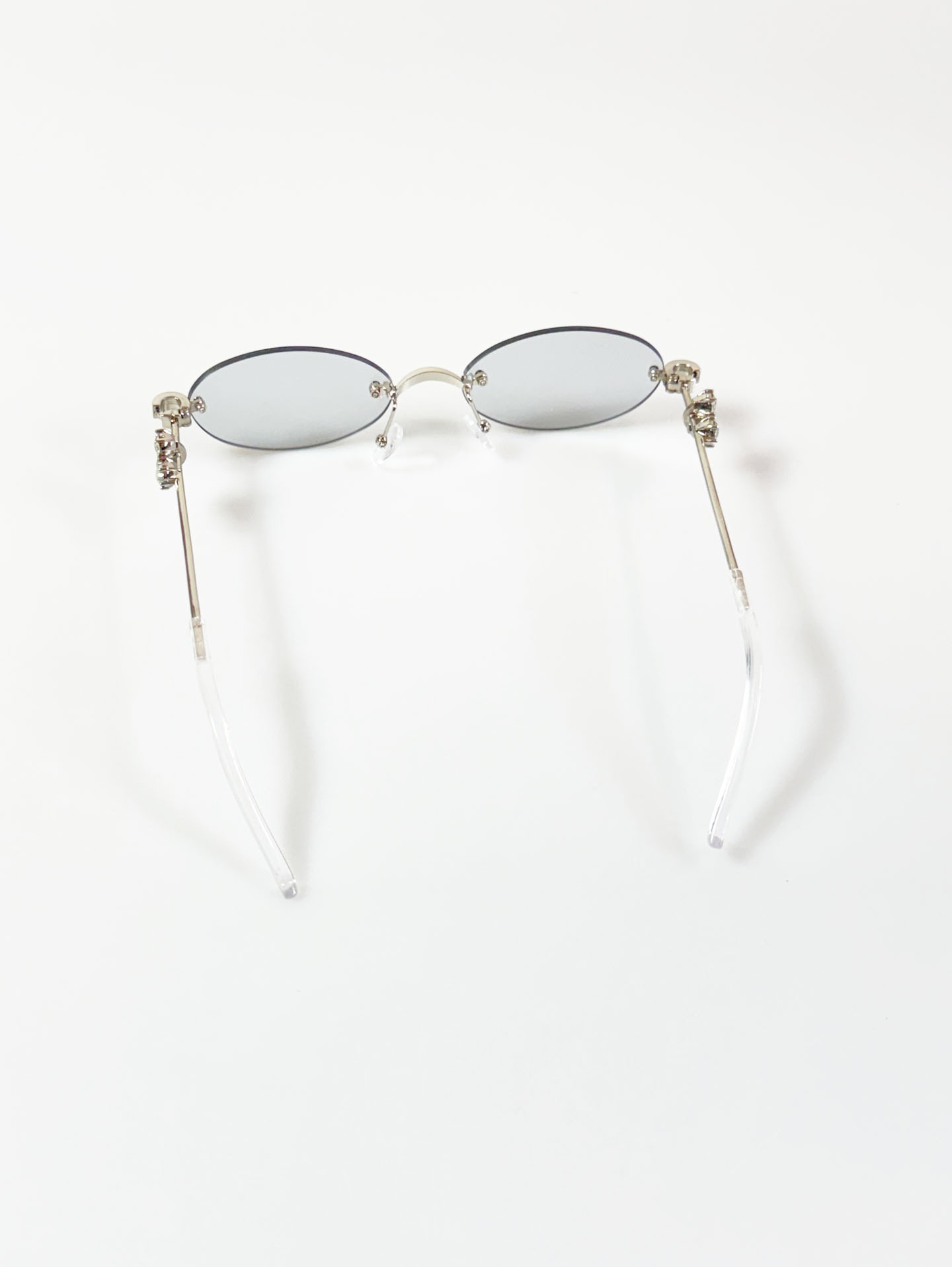 Crystal Detail Rimless Oval Silver Metal Frame Sunglasses