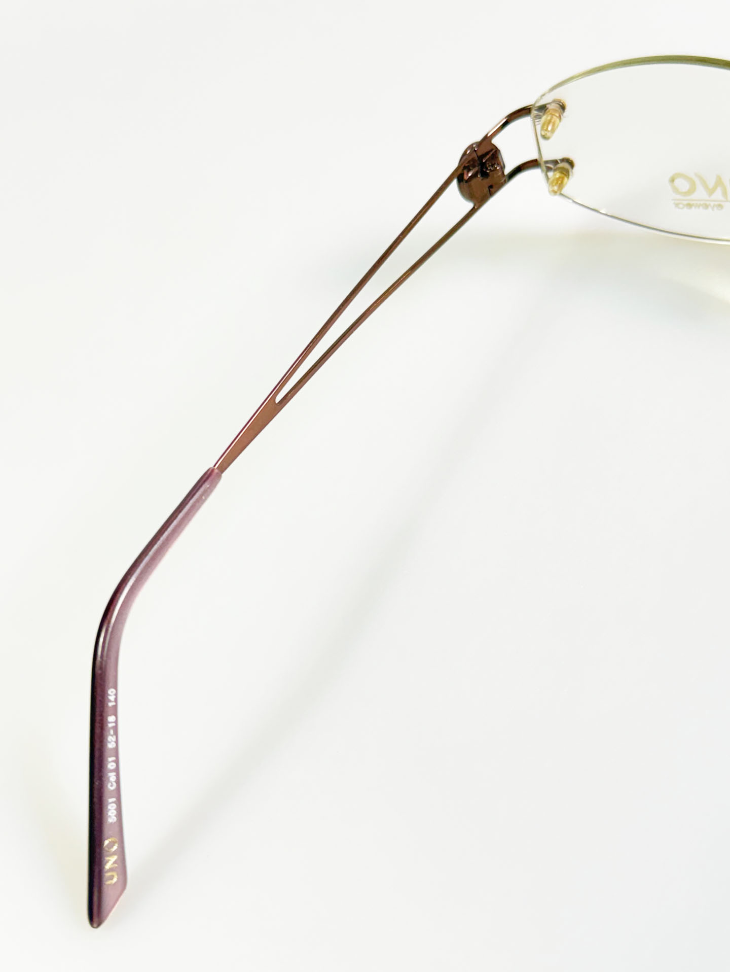 UNO Brown Rimless Oval Metal Glasses