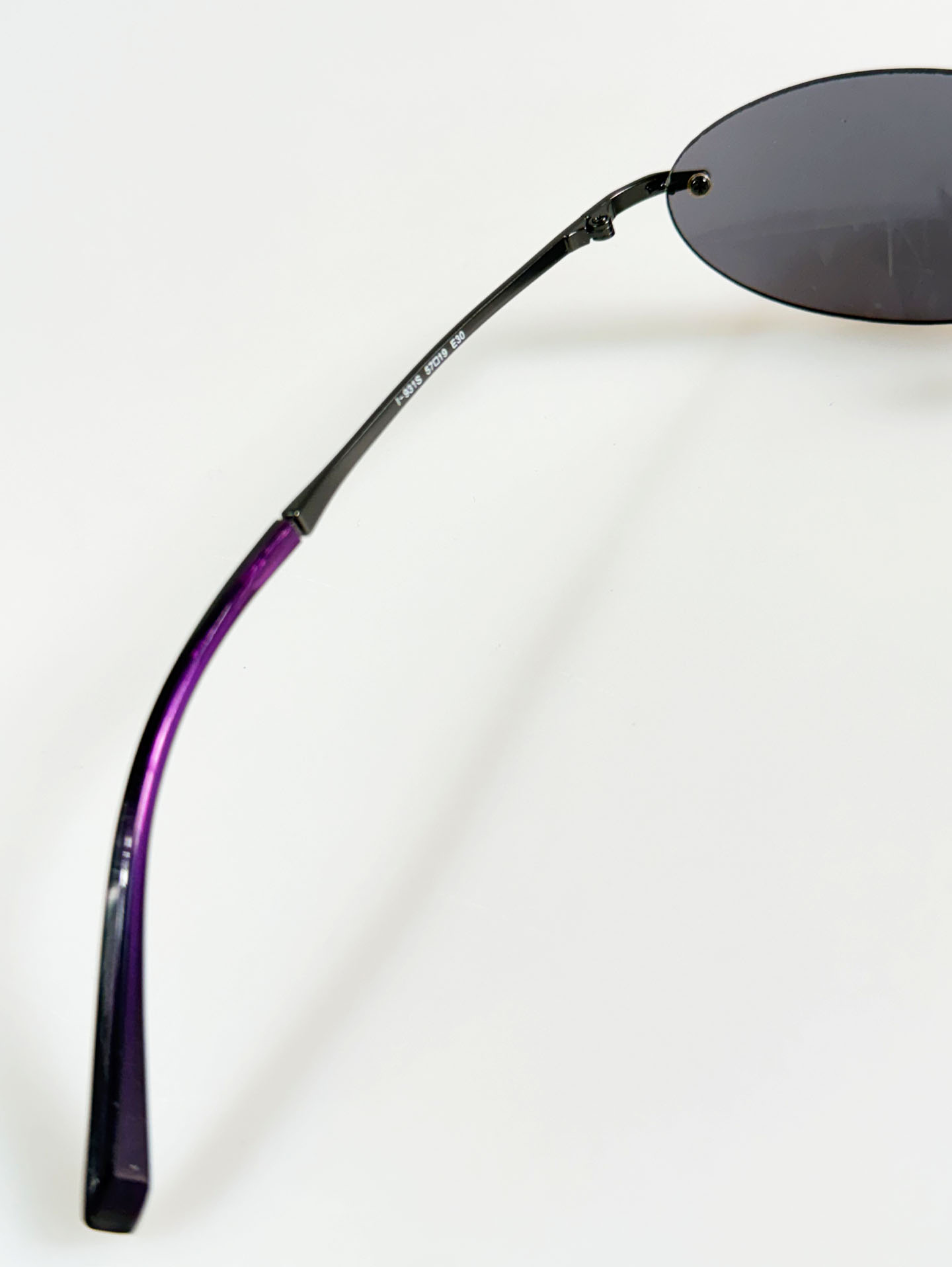 SILVIO VALENCIA Smoke Oval Rimless Metal Sunglasses