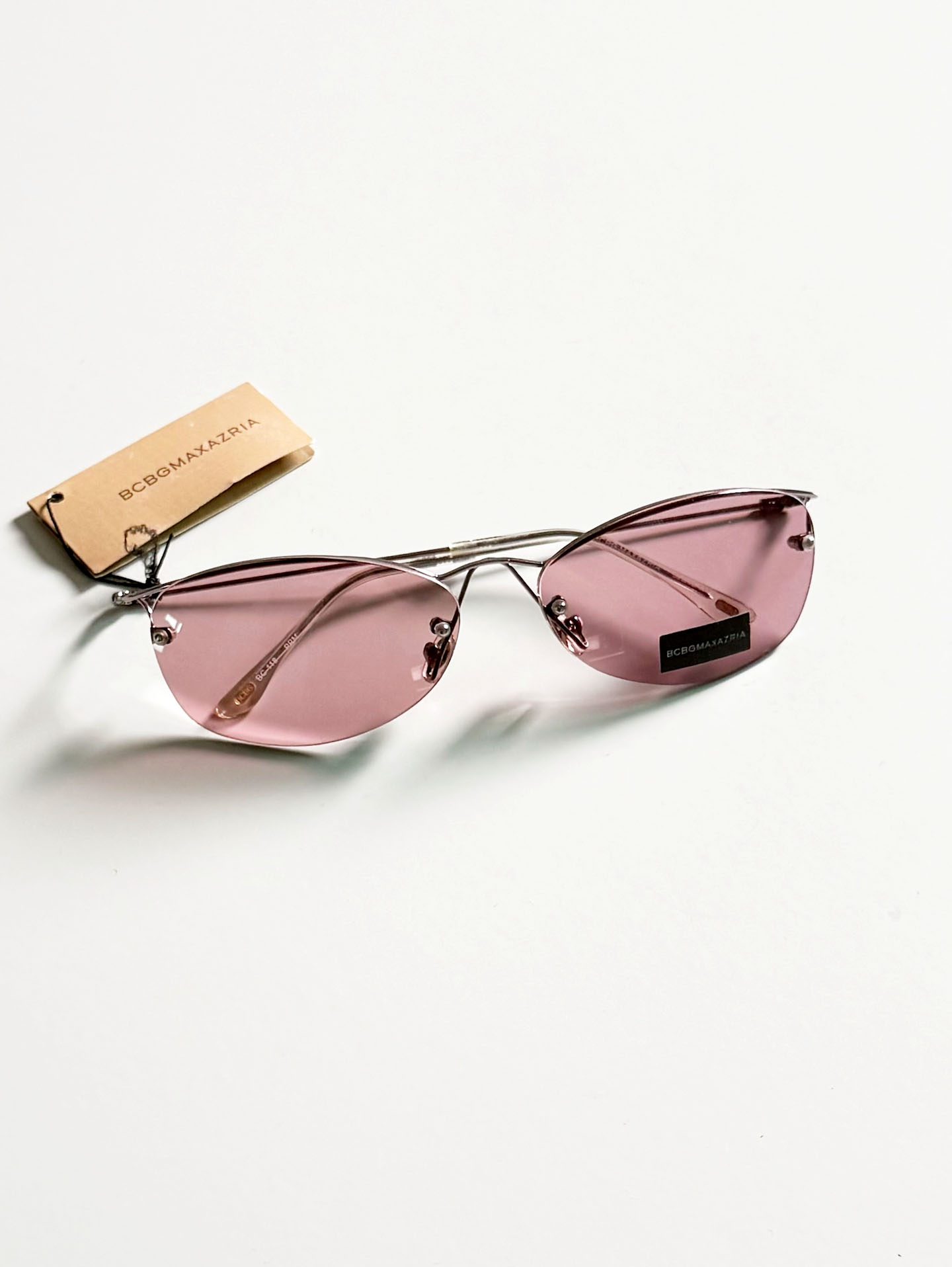 BCBGMAXAZRIA Slim Oval Rimless Metal Tint Sunglasses