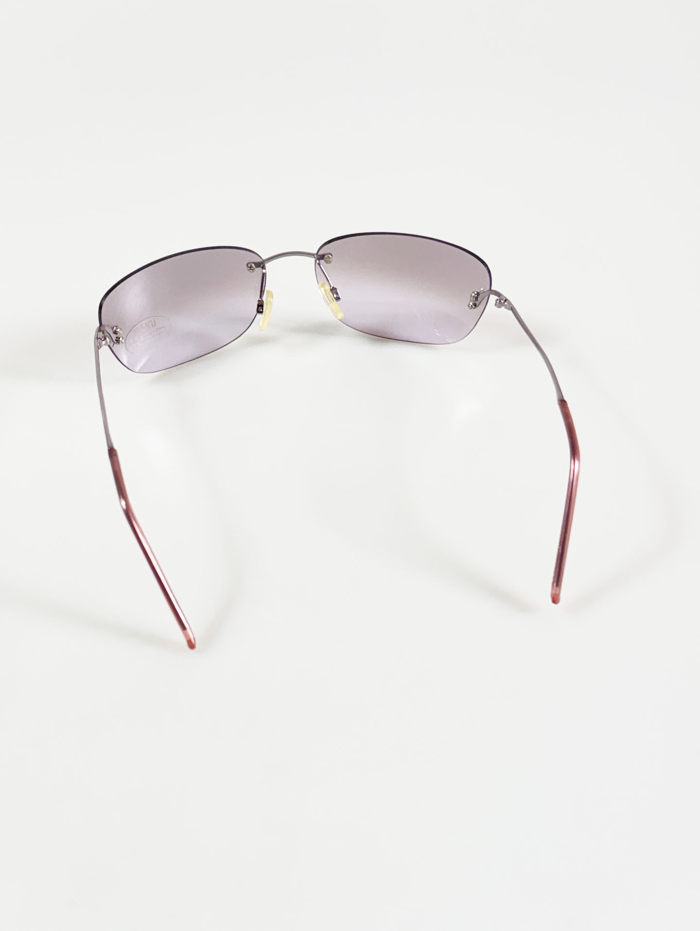 INKOGNITO Silver Rimless Square Tint Sunglasses