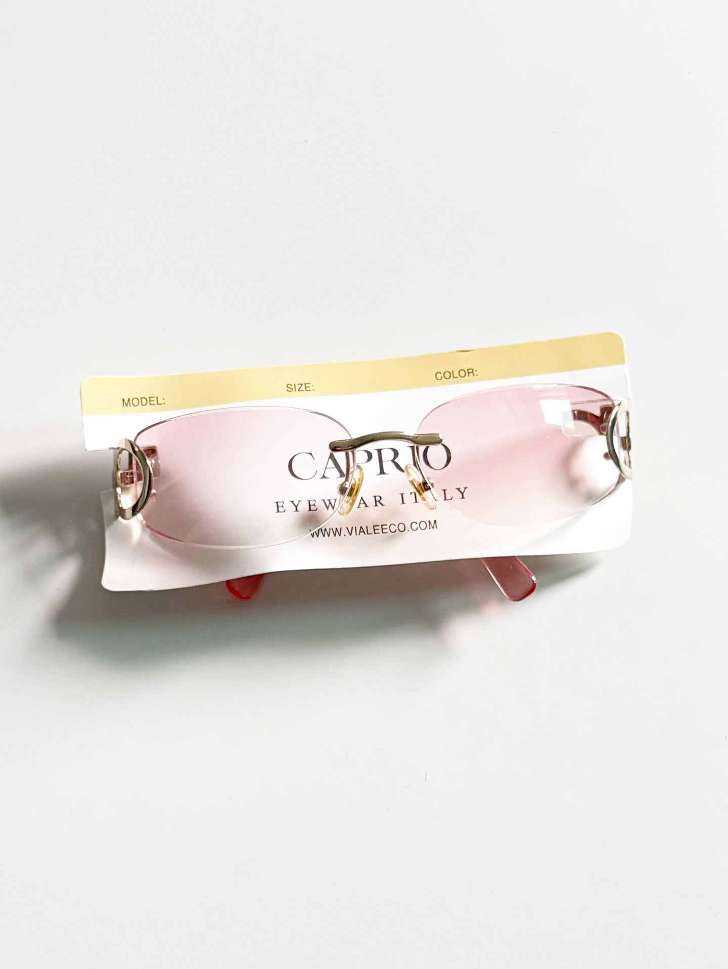 CAPRIO Rimless Square Pink Tint Metal Sunglasses