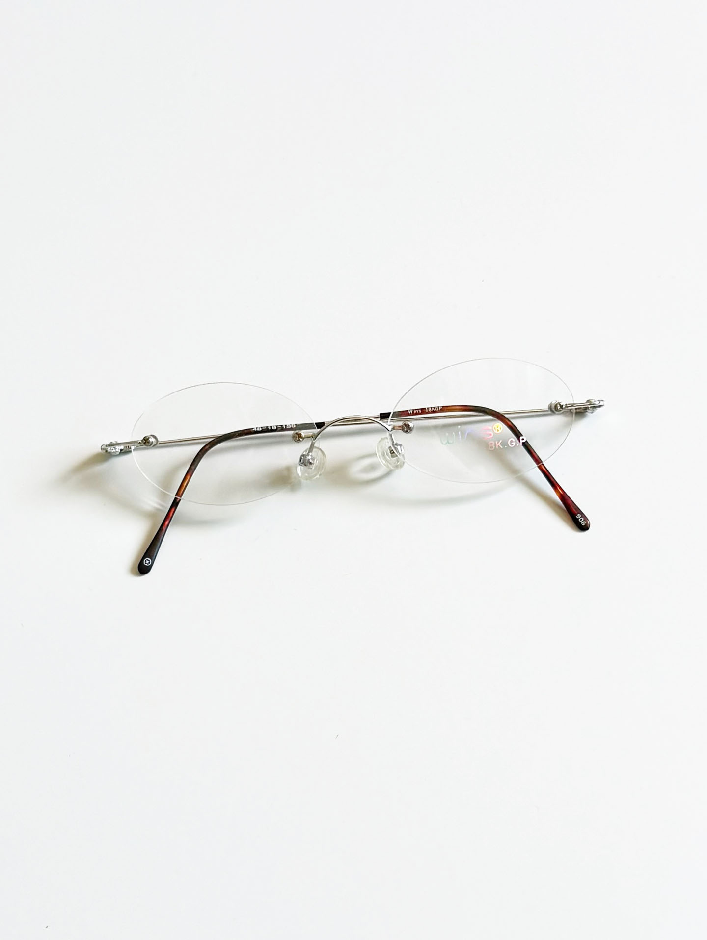 WINS Silver Rimless Oval Metal Frame Glasses