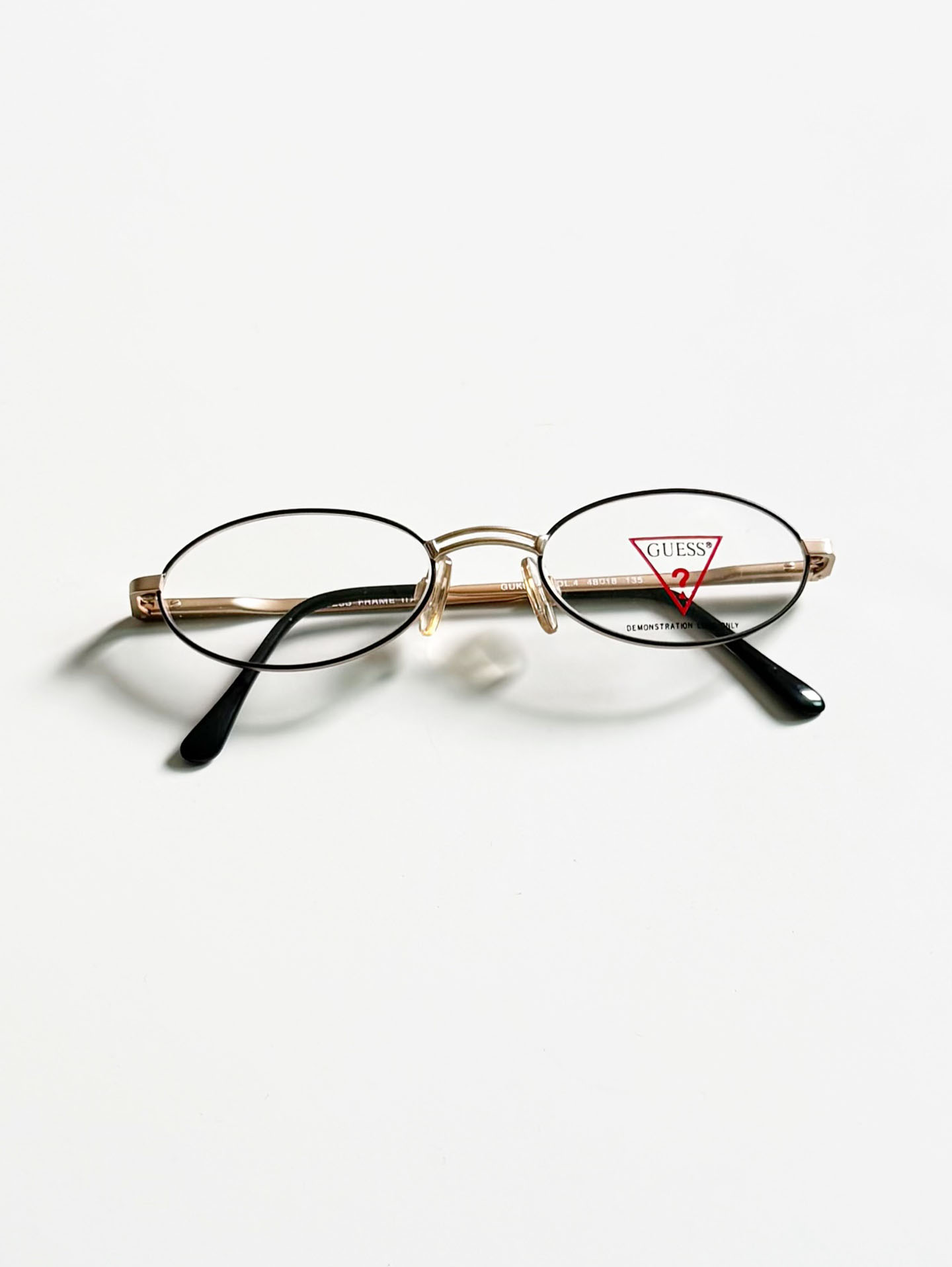 GUESS Matte Gold Slim Oval Metal Glasses