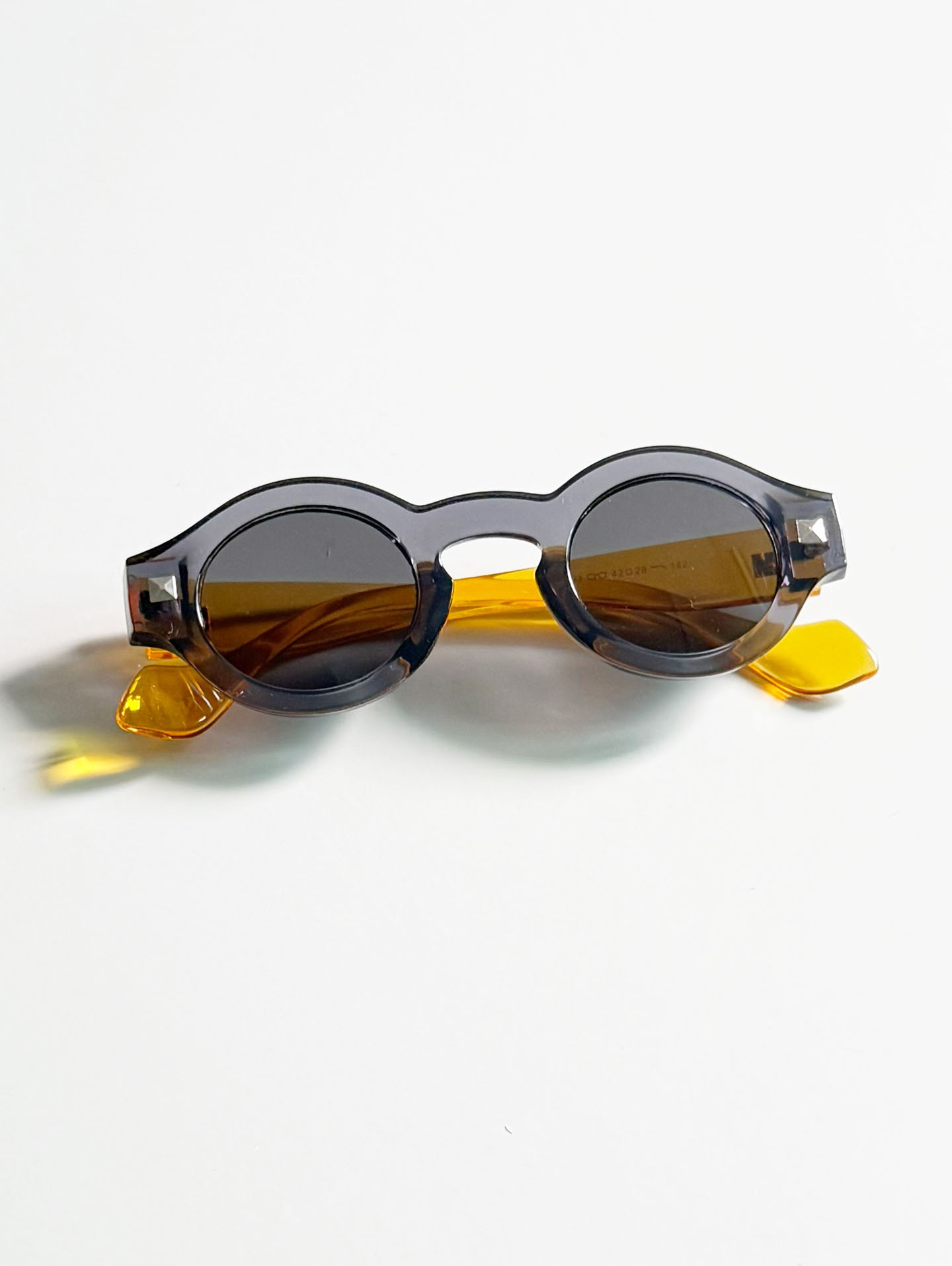 Smoke Gray & Amber Two-Tone Bold Round Sunglasses