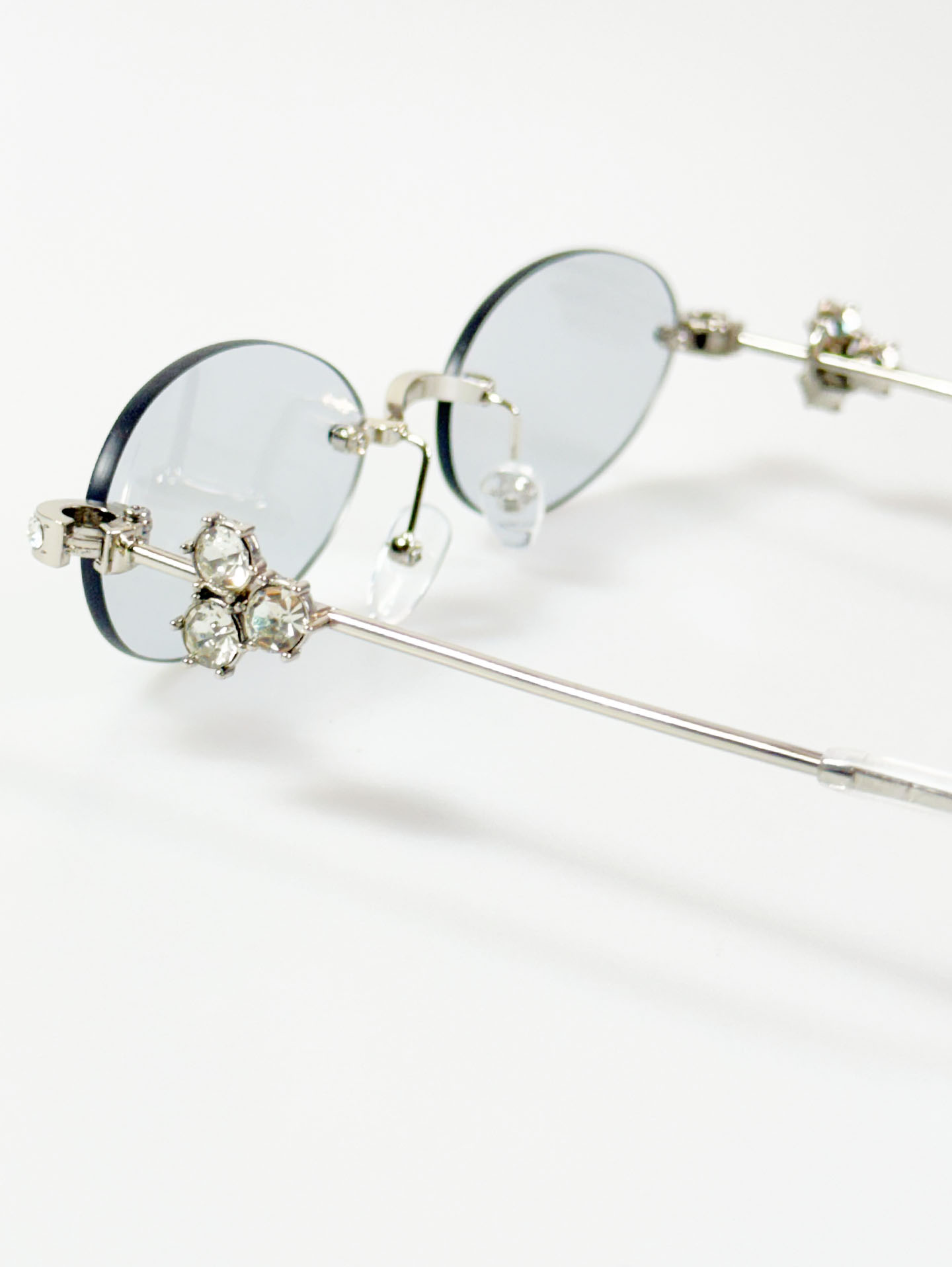 Crystal Detail Rimless Oval Silver Metal Frame Sunglasses