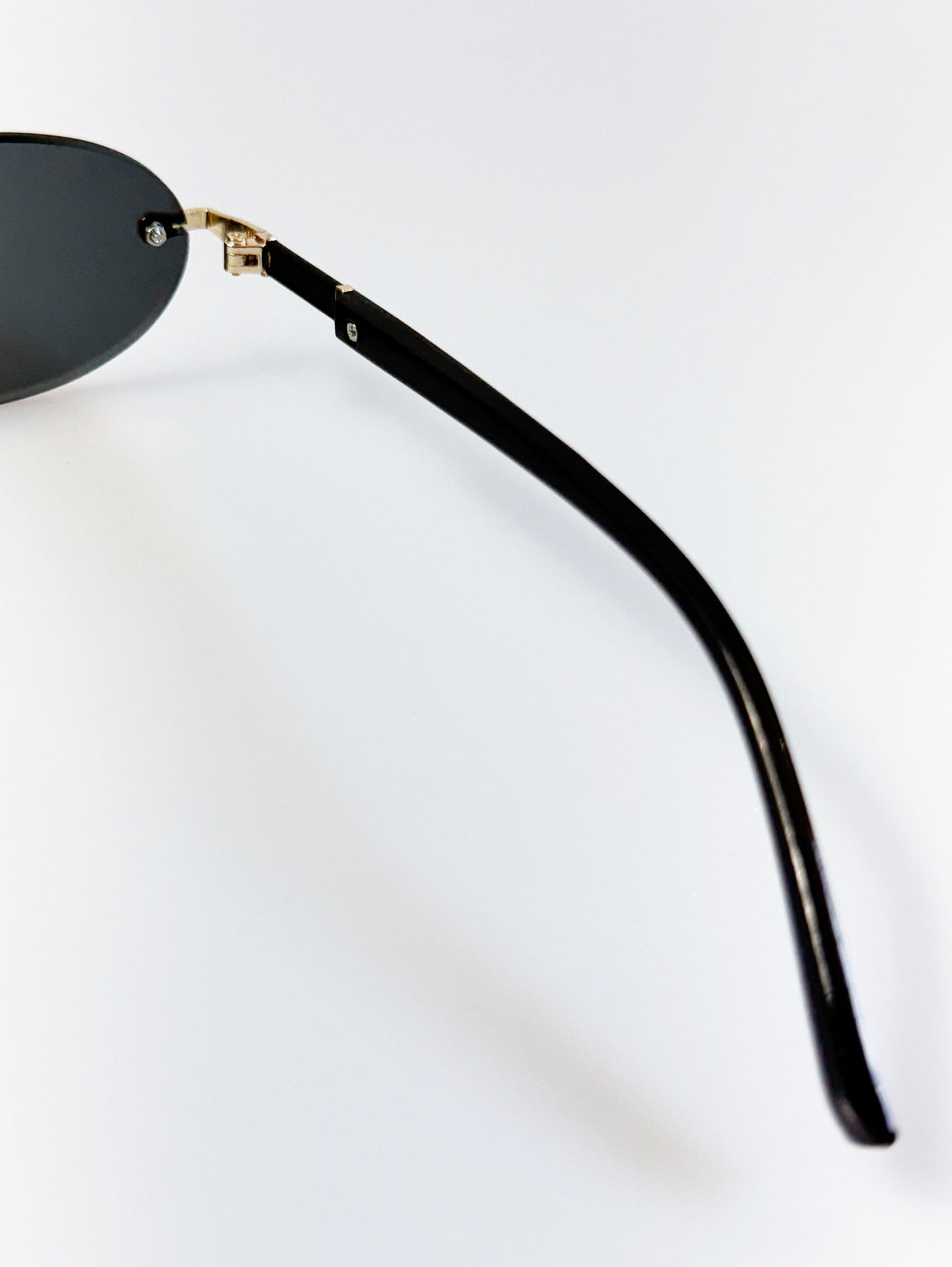 Rimless Oval Gold Metal Frame Smoke Gray Lens Sunglasses