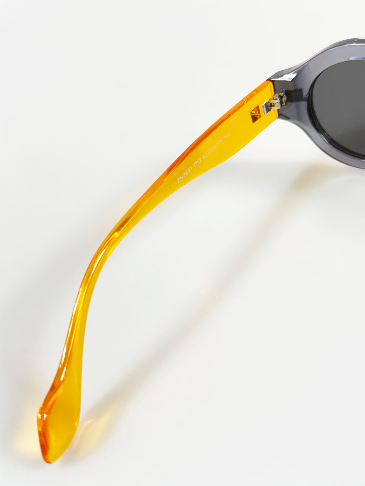Smoke Gray & Amber Two-Tone Bold Round Sunglasses