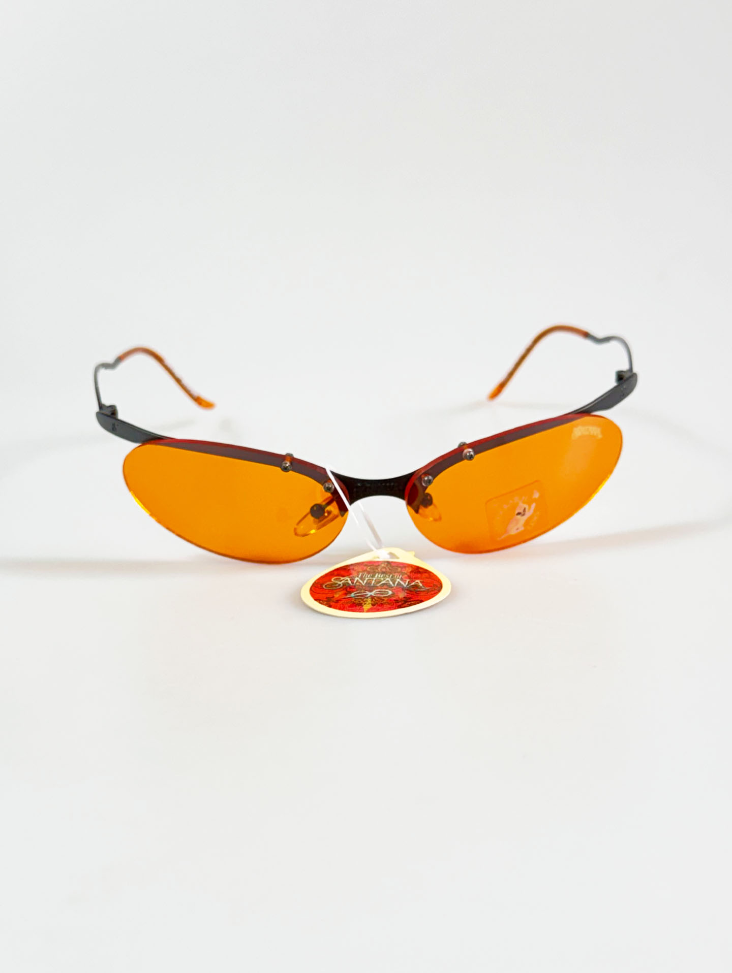 90's SANTANA Gunmetal Rimless Oval Orange Tint Sunglasses
