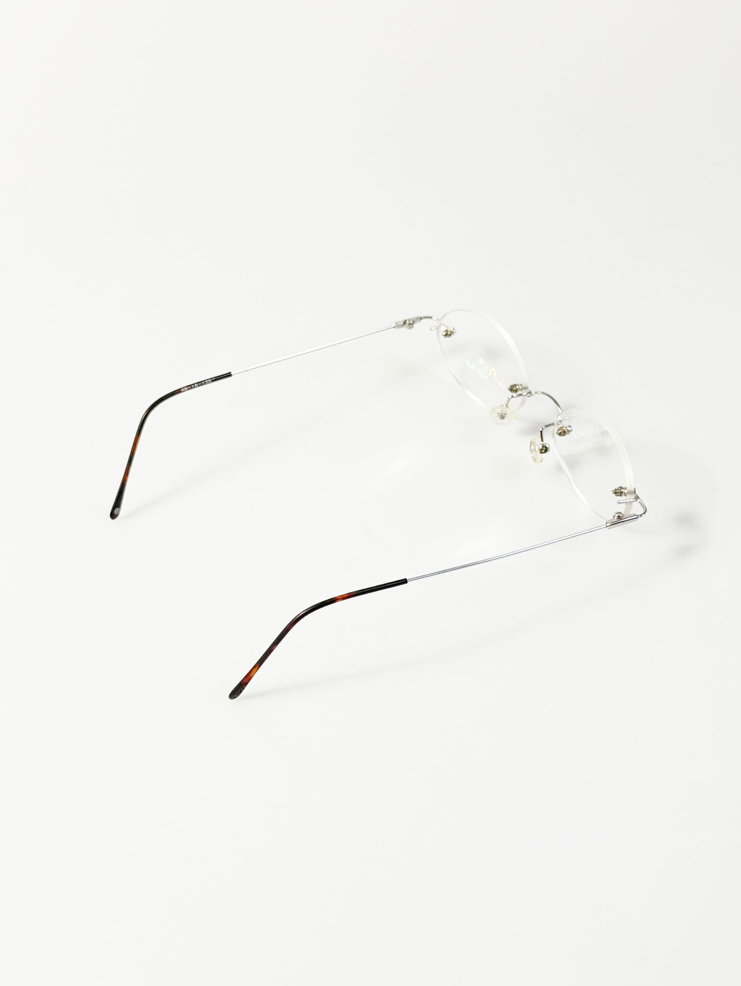 WINS Silver Rimless Oval Metal Frame Glasses