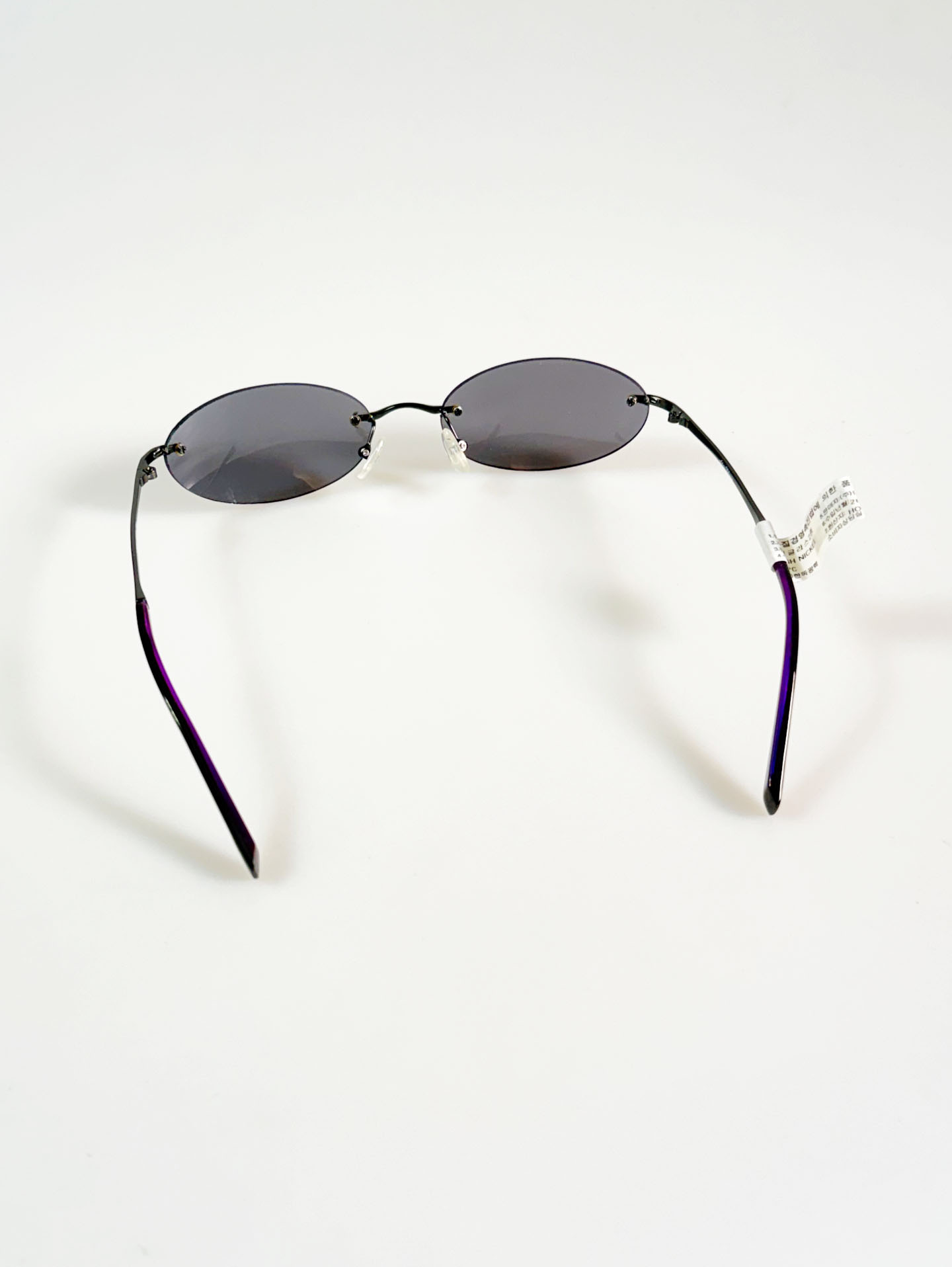 SILVIO VALENCIA Smoke Oval Rimless Metal Sunglasses
