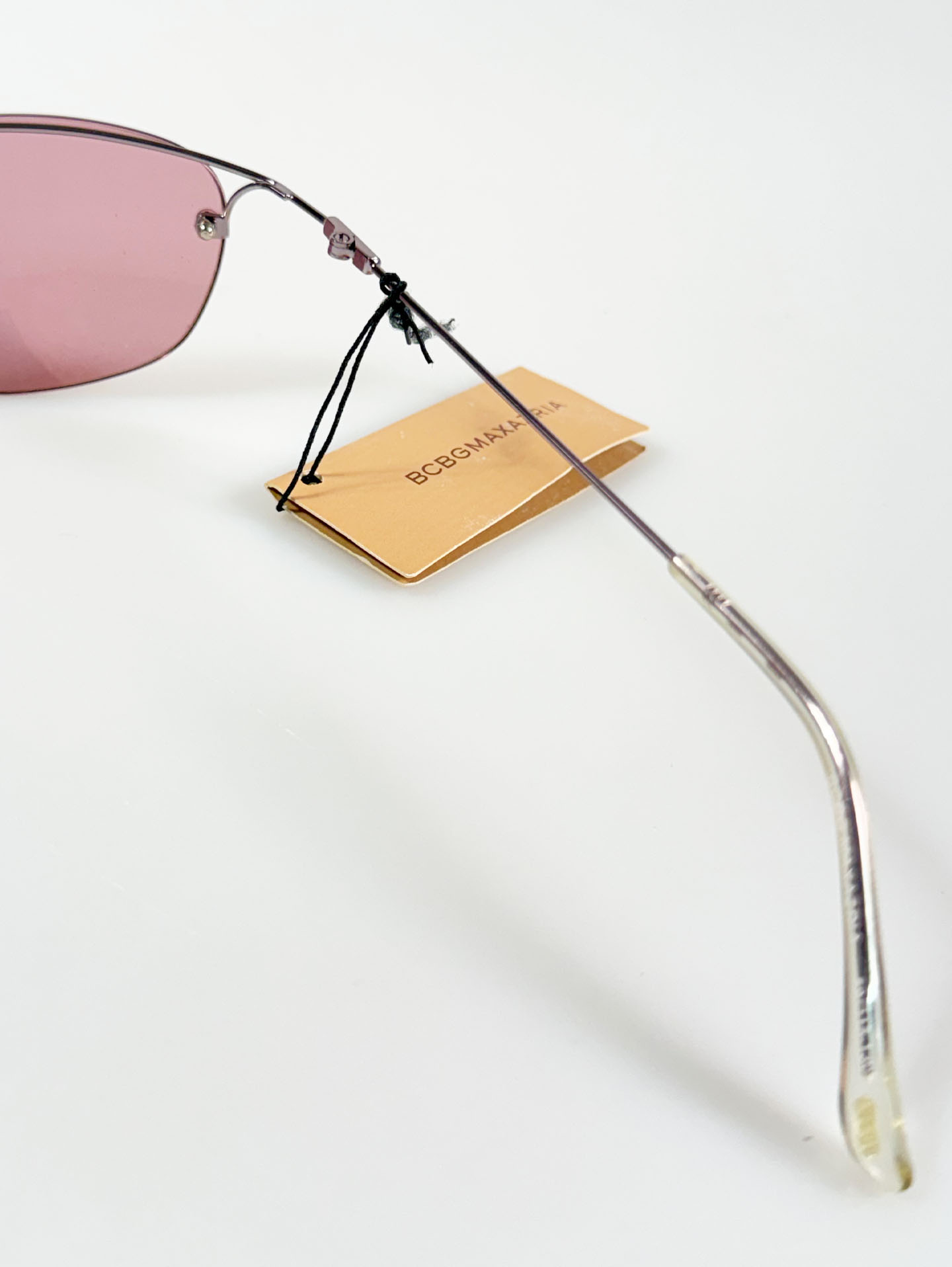 BCBGMAXAZRIA Slim Oval Rimless Metal Tint Sunglasses