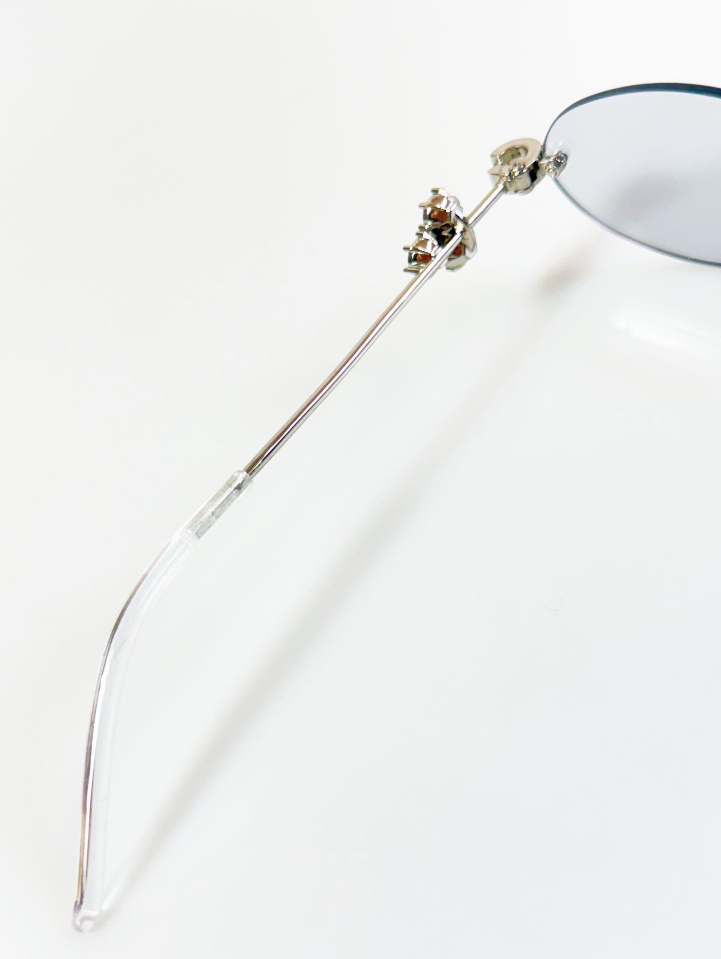 Crystal Detail Rimless Oval Silver Metal Frame Sunglasses