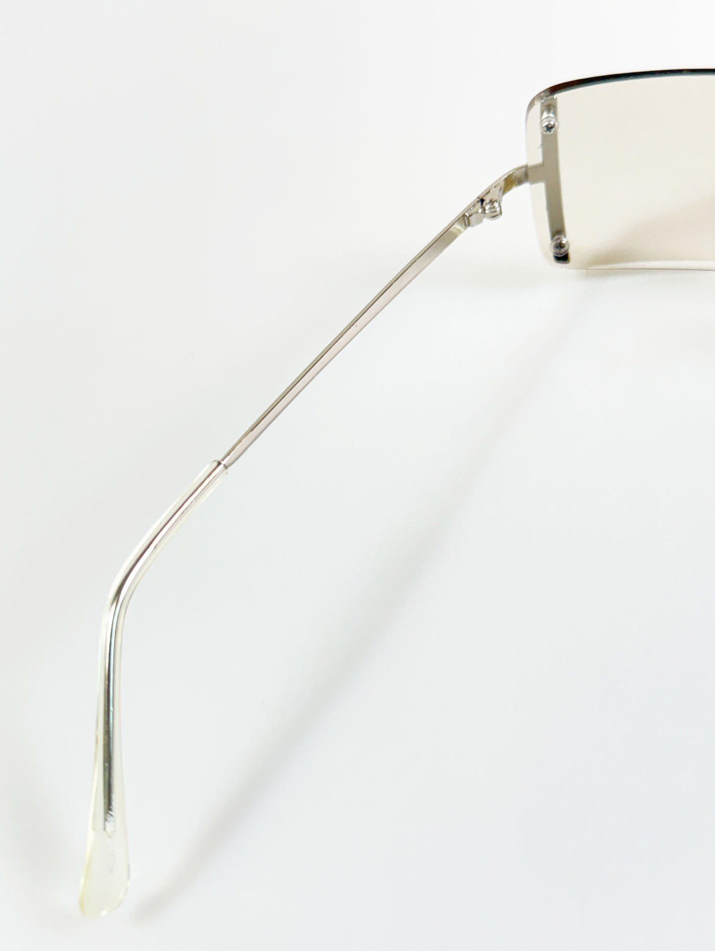 CAPRIO Silver Rimless Square Metal Clear Tinted Sunglasses