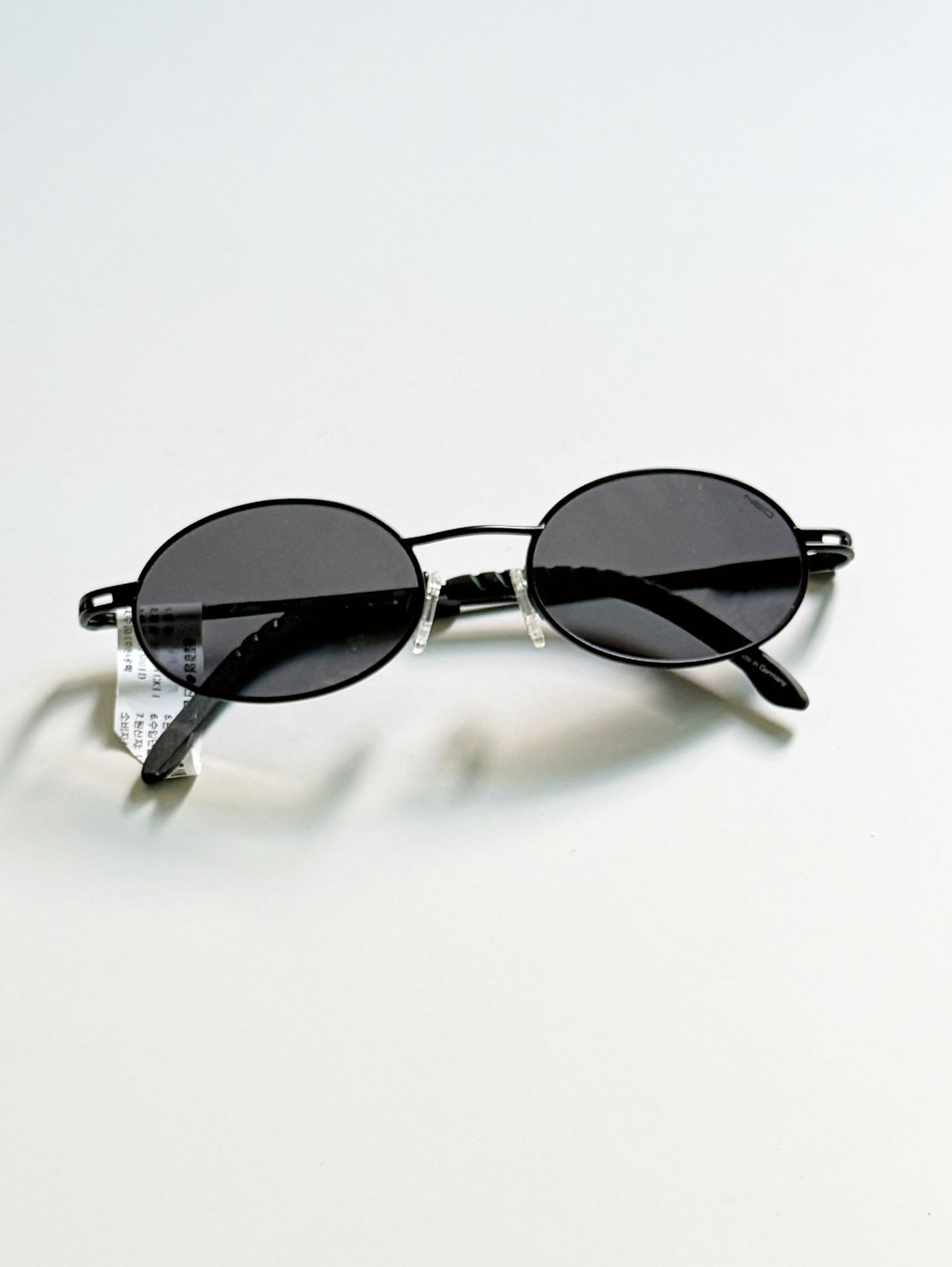 HOLIDAY by NEOSTYLE Black Slim Oval Metal Frame Sunglasses