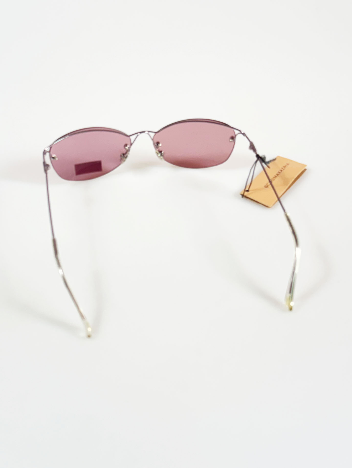 BCBGMAXAZRIA Slim Oval Rimless Metal Tint Sunglasses